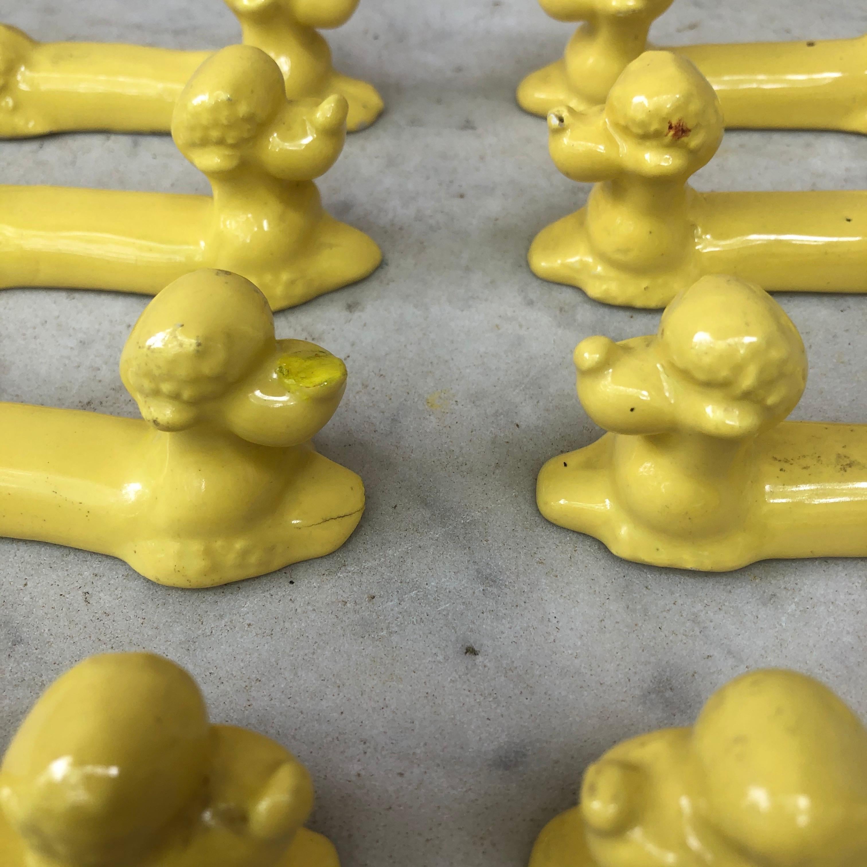 Set of 8 yellow Majolica knife rests with poodle.
Vallauris, circa 1950.
Few chips.

  