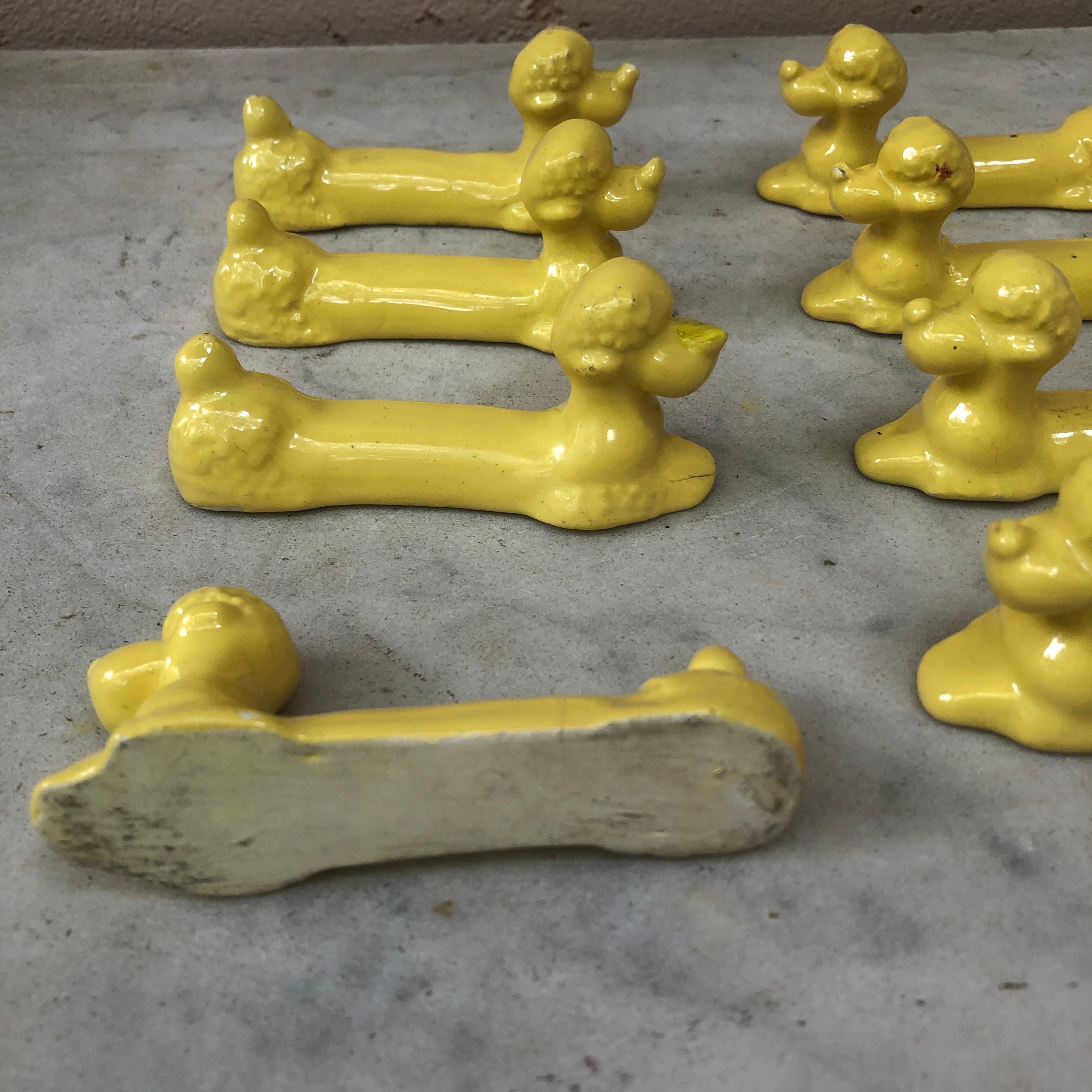 French Set of Eight Yellow Majolica Poodle Knife Rests Vallauris, circa 1950
