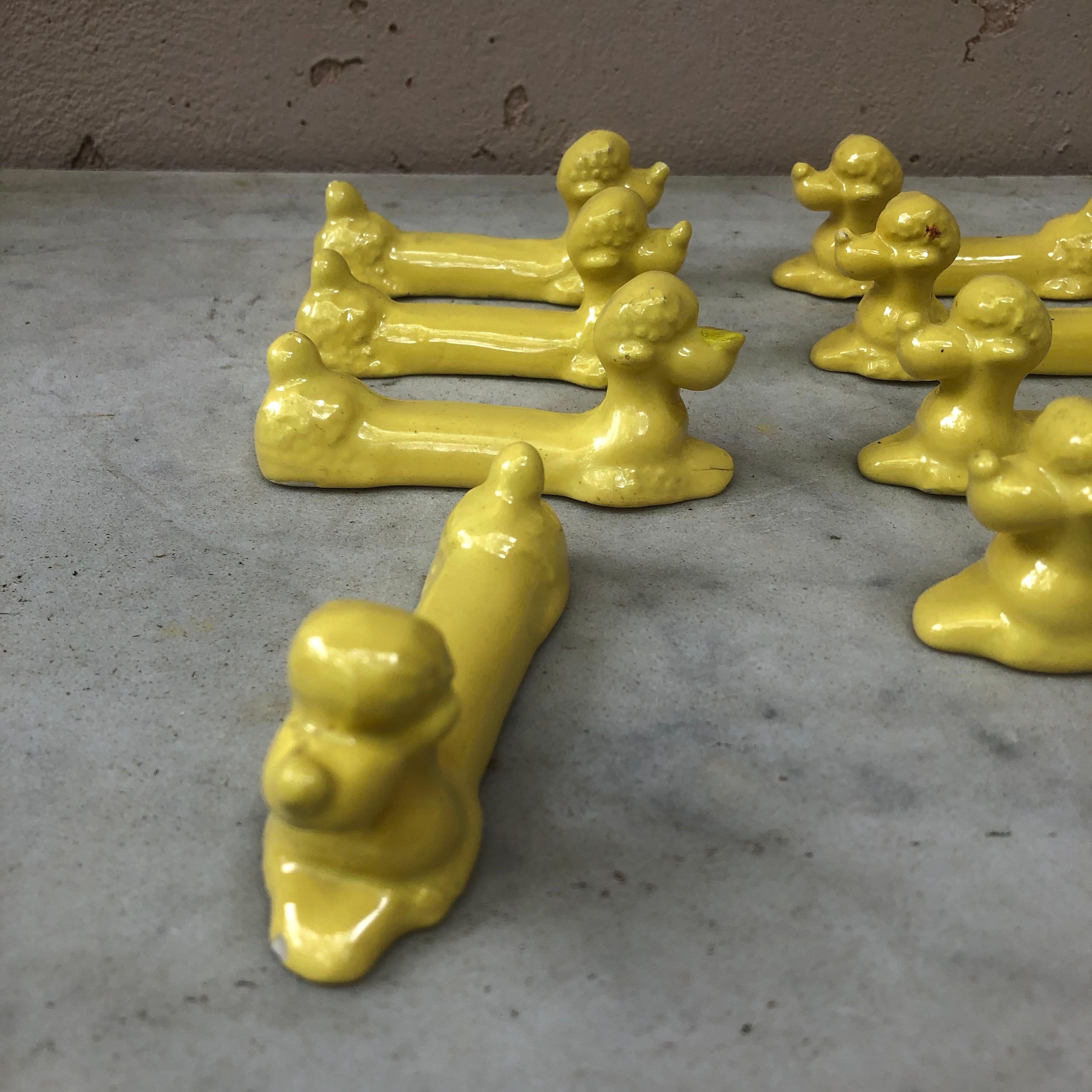 Set of Eight Yellow Majolica Poodle Knife Rests Vallauris, circa 1950 In Good Condition For Sale In Austin, TX
