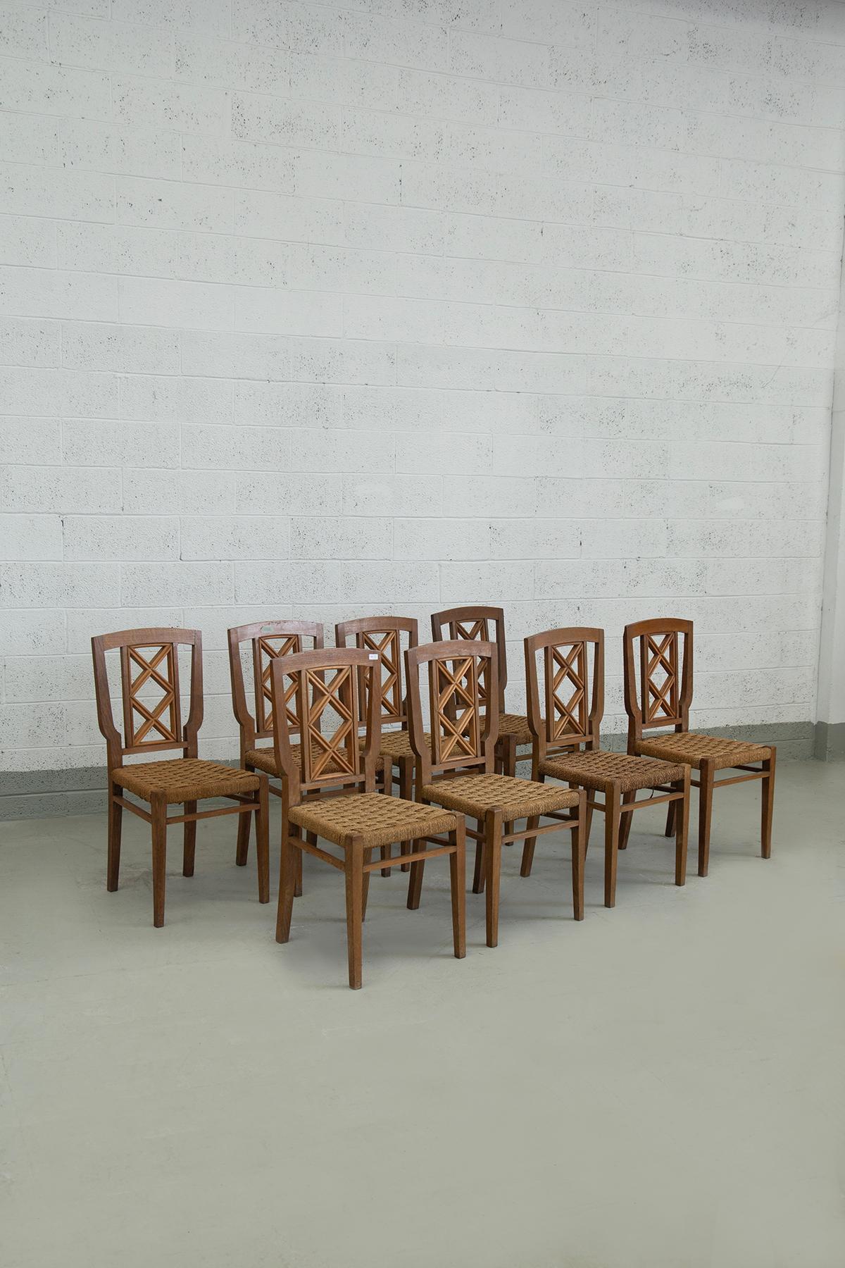 Set of Eight Italian Dining Chairs Attributed to Paolo Buffa – 1950s Natural Wood and Woven Cord Seats
This elegant set of eight Italian dining chairs from the 1950s is attributed to Paolo Buffa, based on the craftsmanship, material selection, and