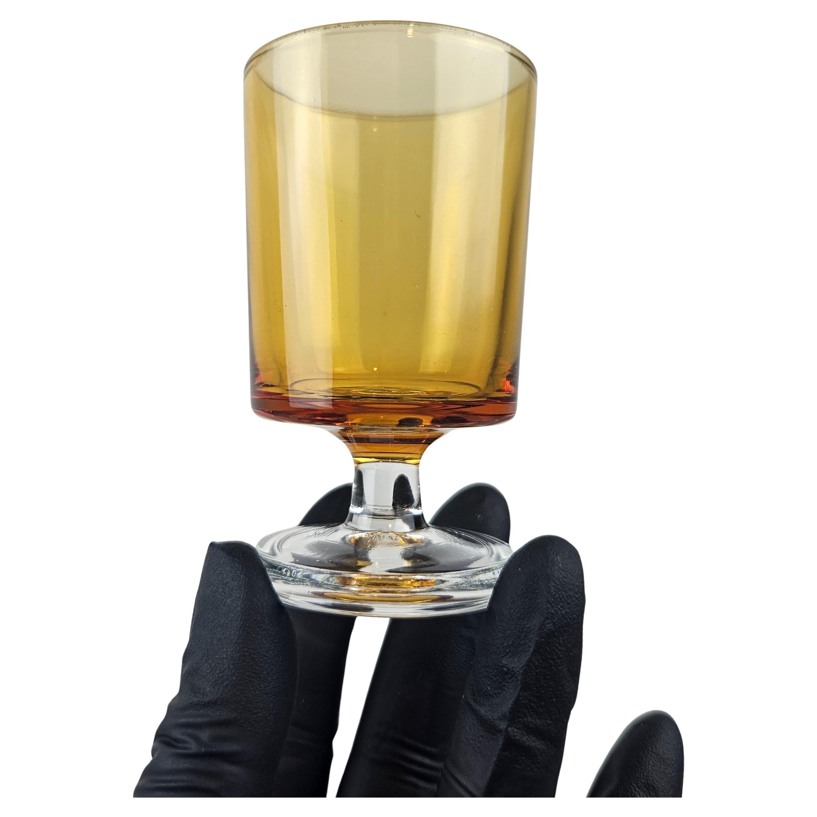 Set of Eleven Amber Glasses, France 1970s en vente