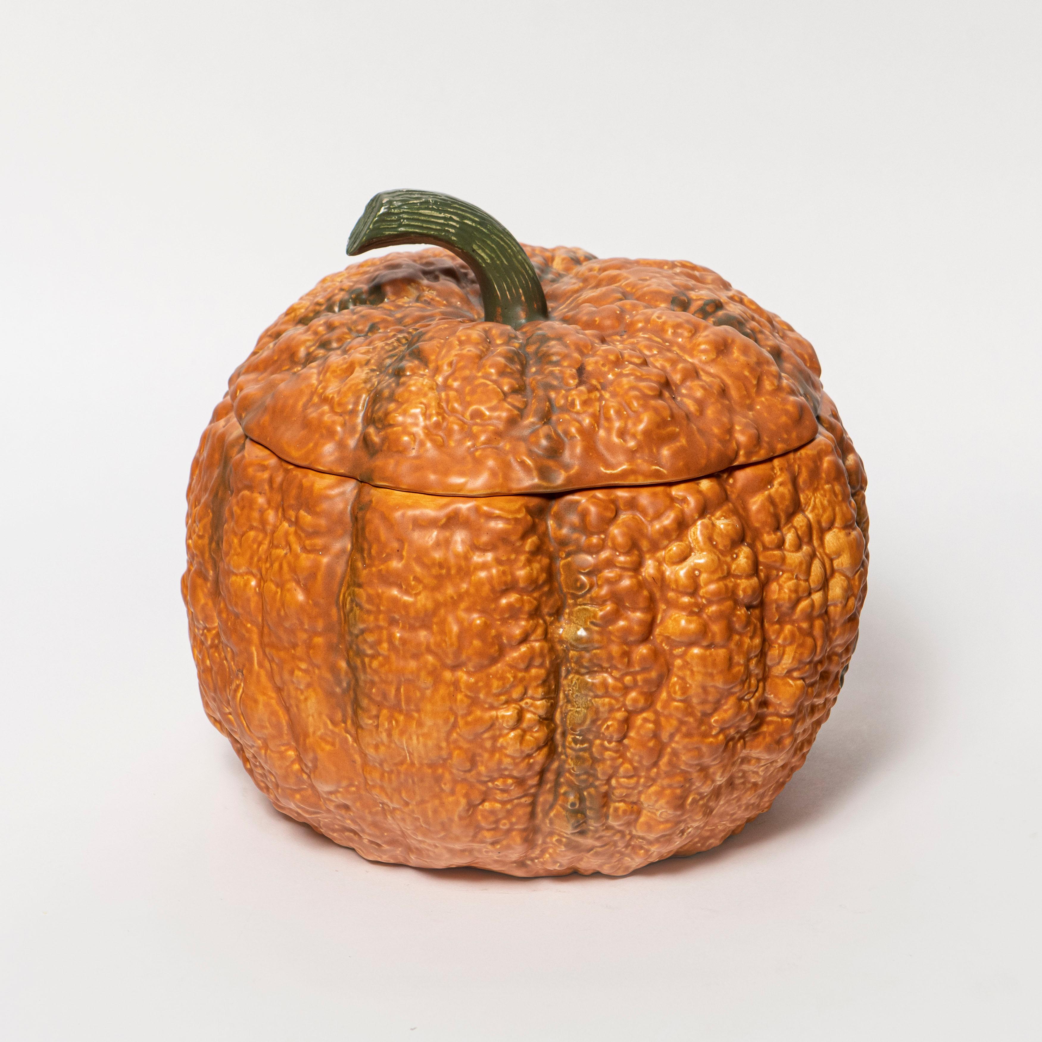 Set of eleven glazed ceramic Pumpkins, France, circa 1960
One big pumpkin and ten small ones.

Dimensions big pumpkin: 25 cm height, 27 cm diameter.
Dimensions smalls pumpkins: 12 cm height, 15 cm diameter.