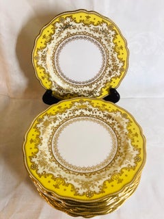 Set of Eleven Yellow Spode Copeland Jeweled Dinner Plates with Raised Gilding