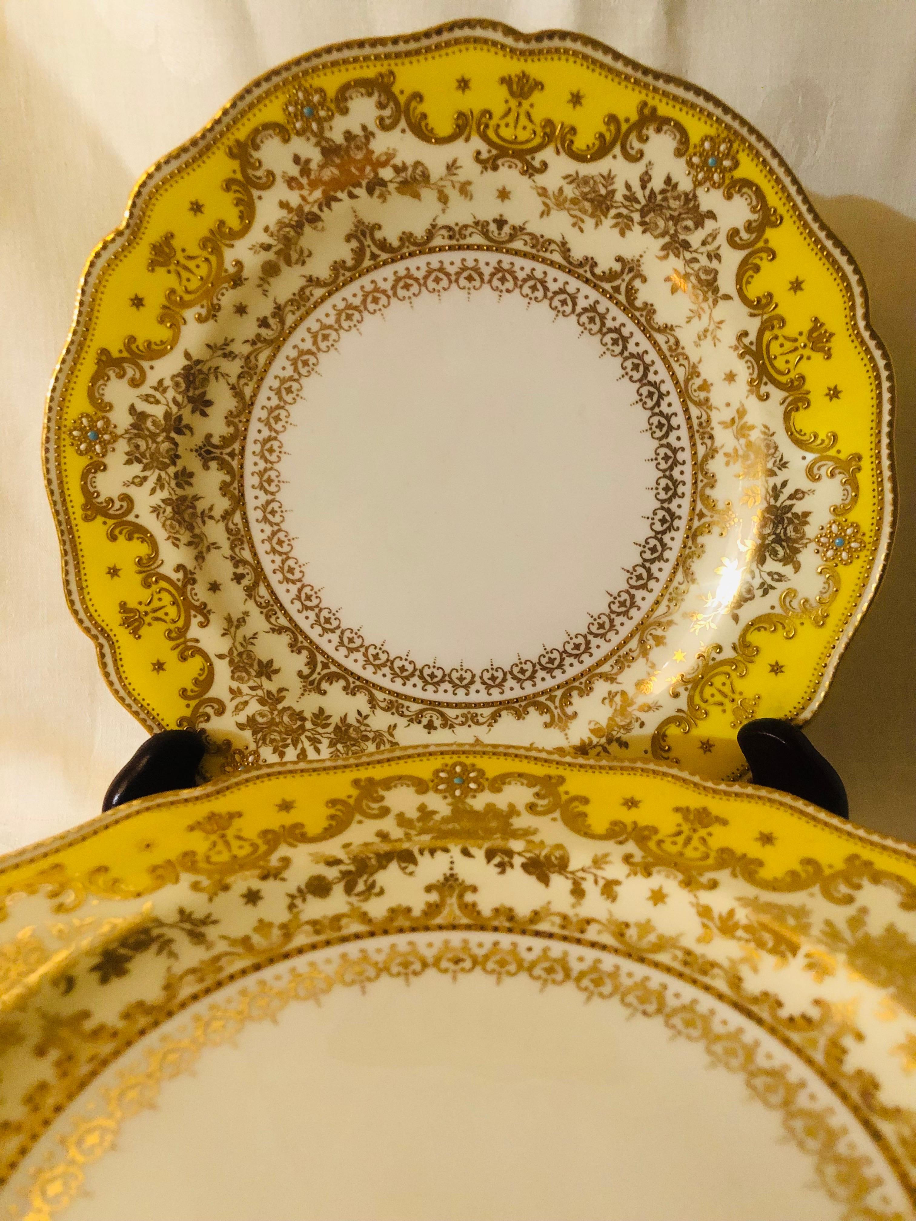 Early 20th Century Set of Eleven Yellow Spode Copeland Jeweled Dinner Plates with Raised Gilding