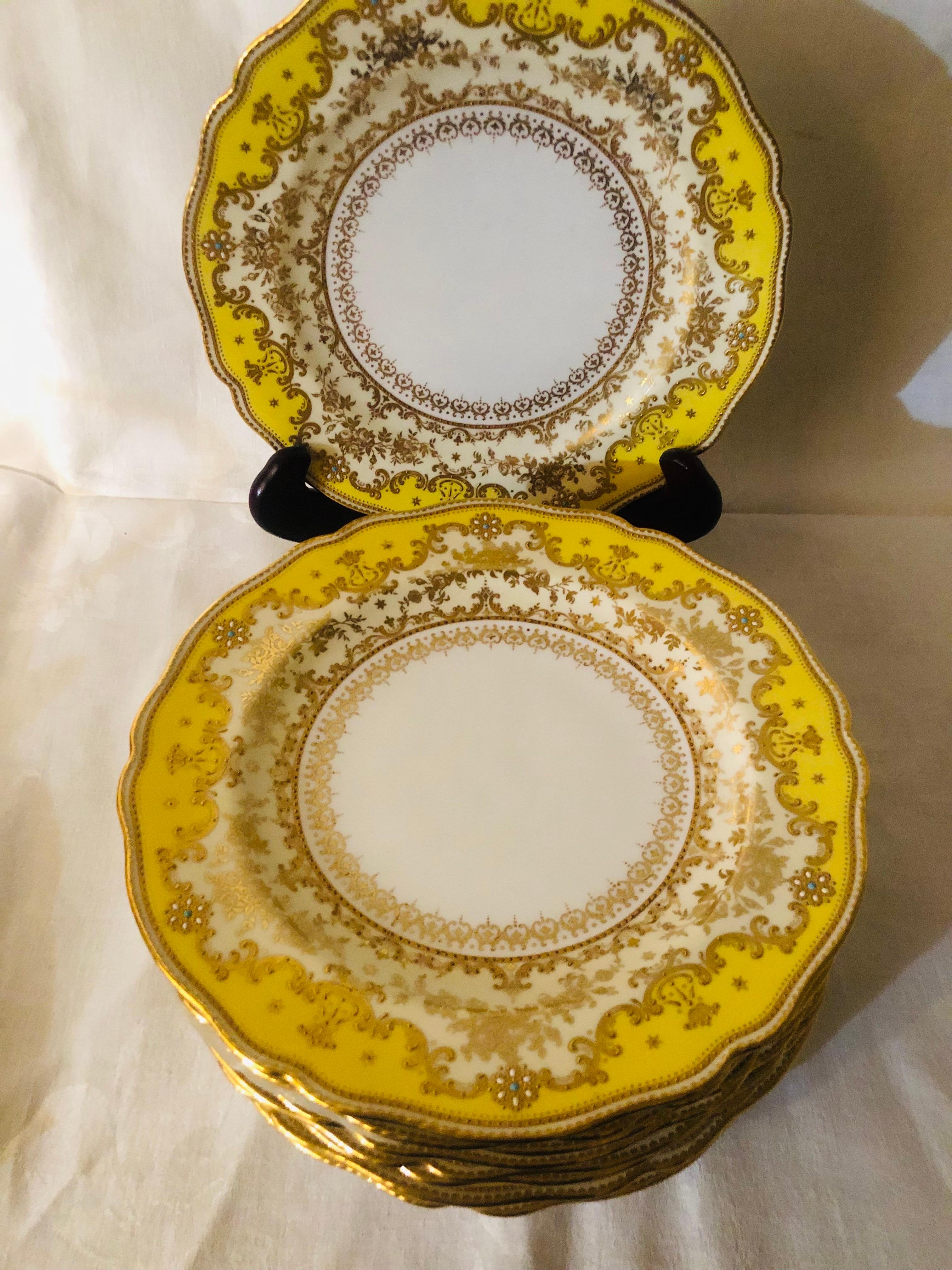Porcelain Set of Eleven Yellow Spode Copeland Jeweled Dinner Plates with Raised Gilding