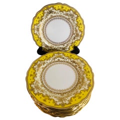 Set of Eleven Yellow Spode Copeland Jeweled Dinner Plates with Raised Gilding