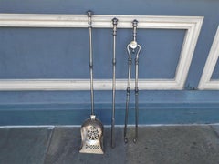 Set of English Urn Finial and Pierced Polished Steel Fire Tools, Circa 1780
