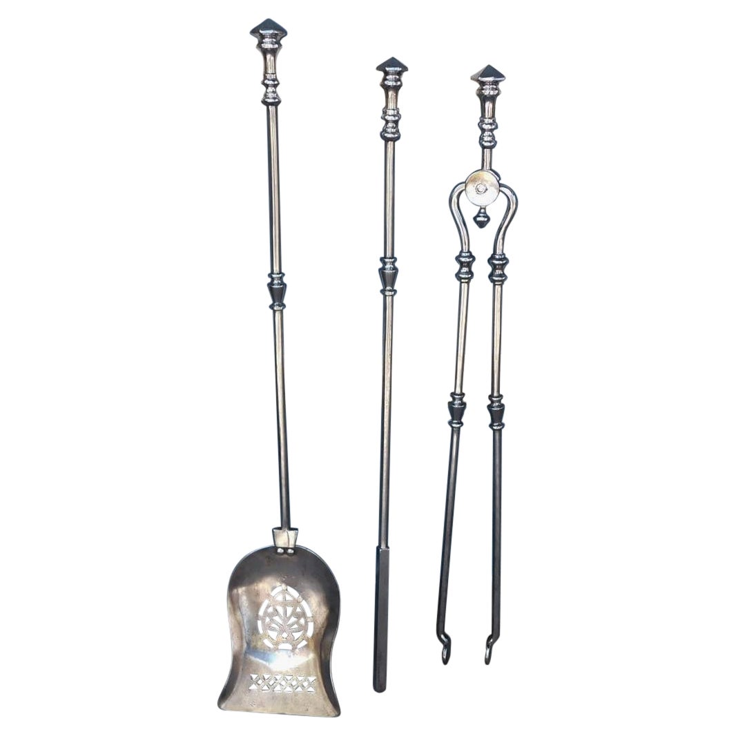 Set of English Urn Finial and Pierced Polished Steel Fire Tools, Circa 1780 For Sale
