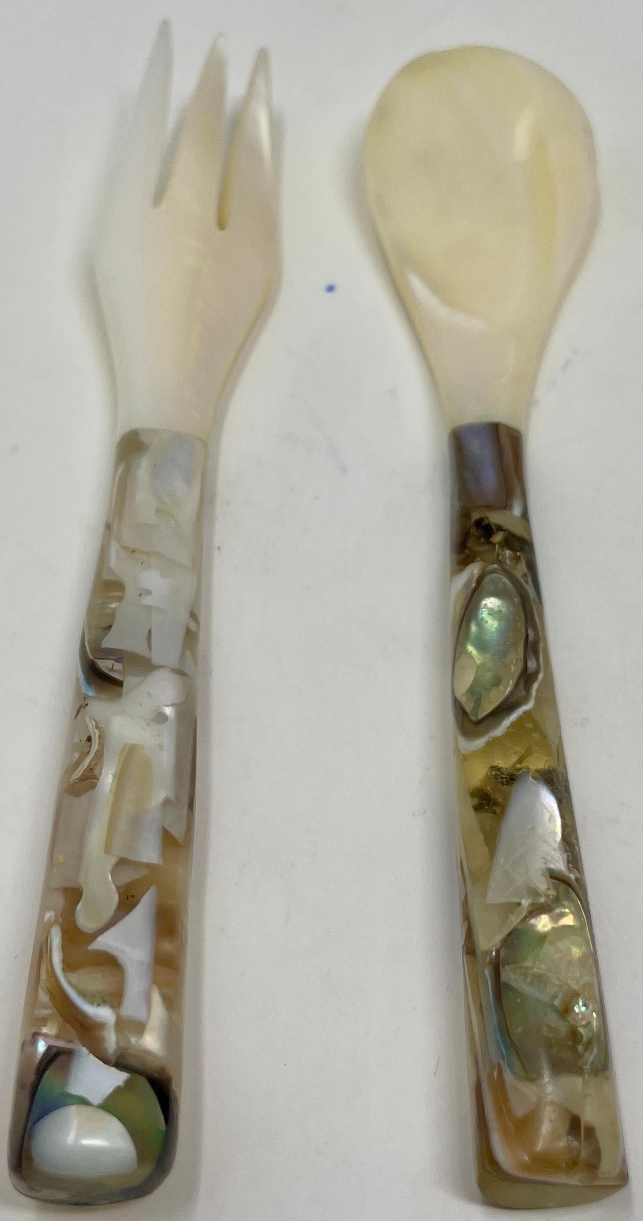 Set of Estate mother of pearl with composite handles caviar serving spoon & fork.
Spoon dimensions: 4.75