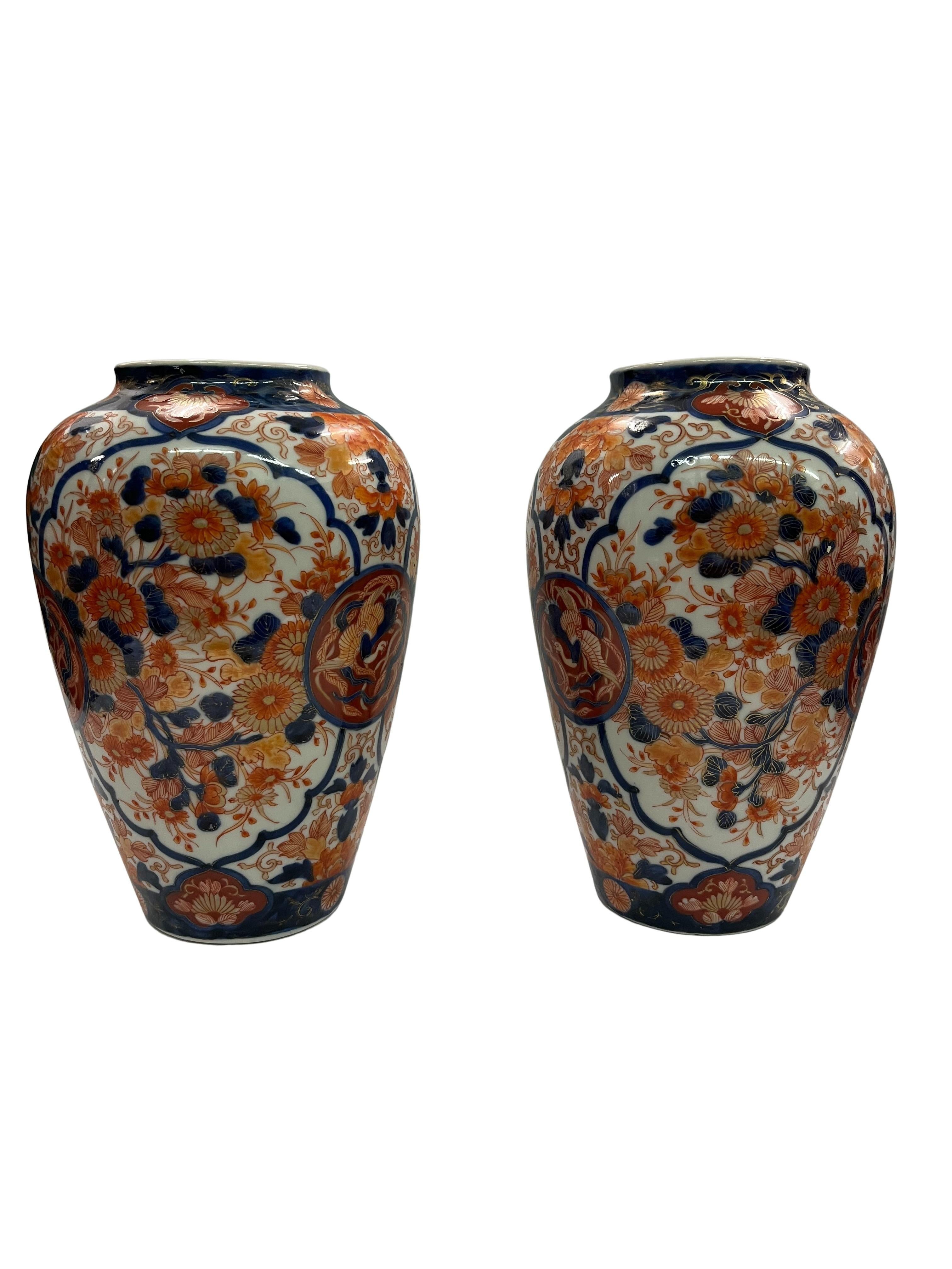 Impressive set of two vases, so-called Imari, made in the Meiji period - late 19th century, originals from Japan.

These vases are in impressive original condition. They have the typical bulbous shape and feature the typical Imari painting. The