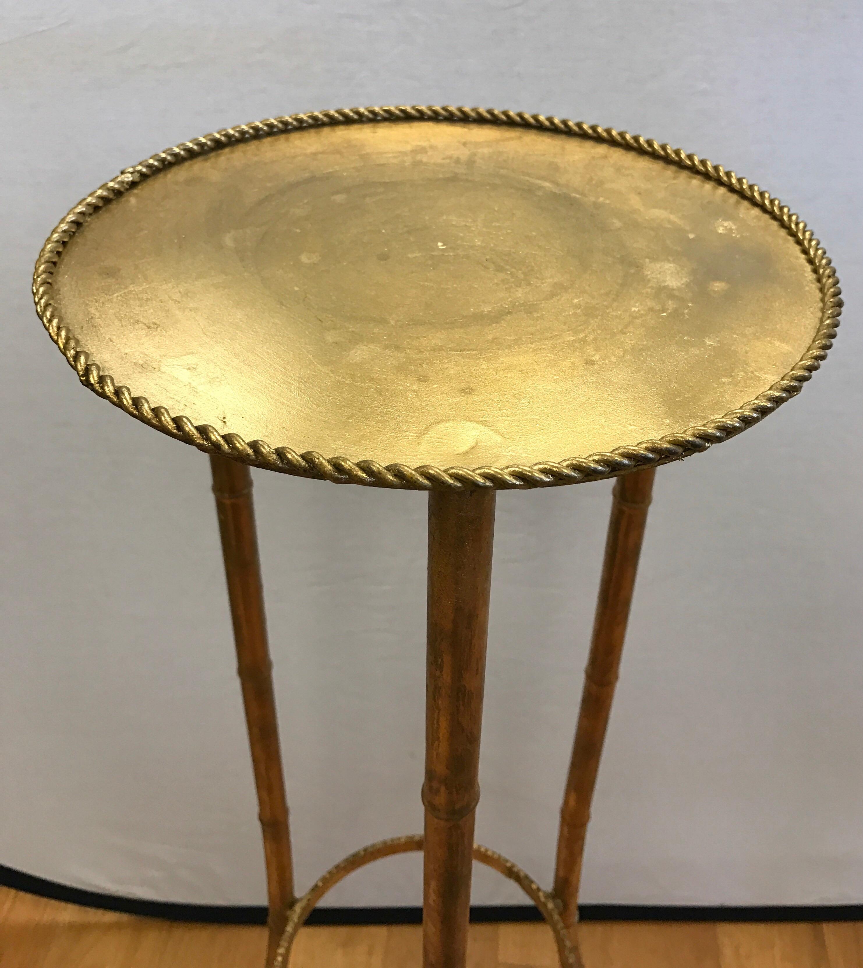 Gold tole metal plant or display pedestal stands.