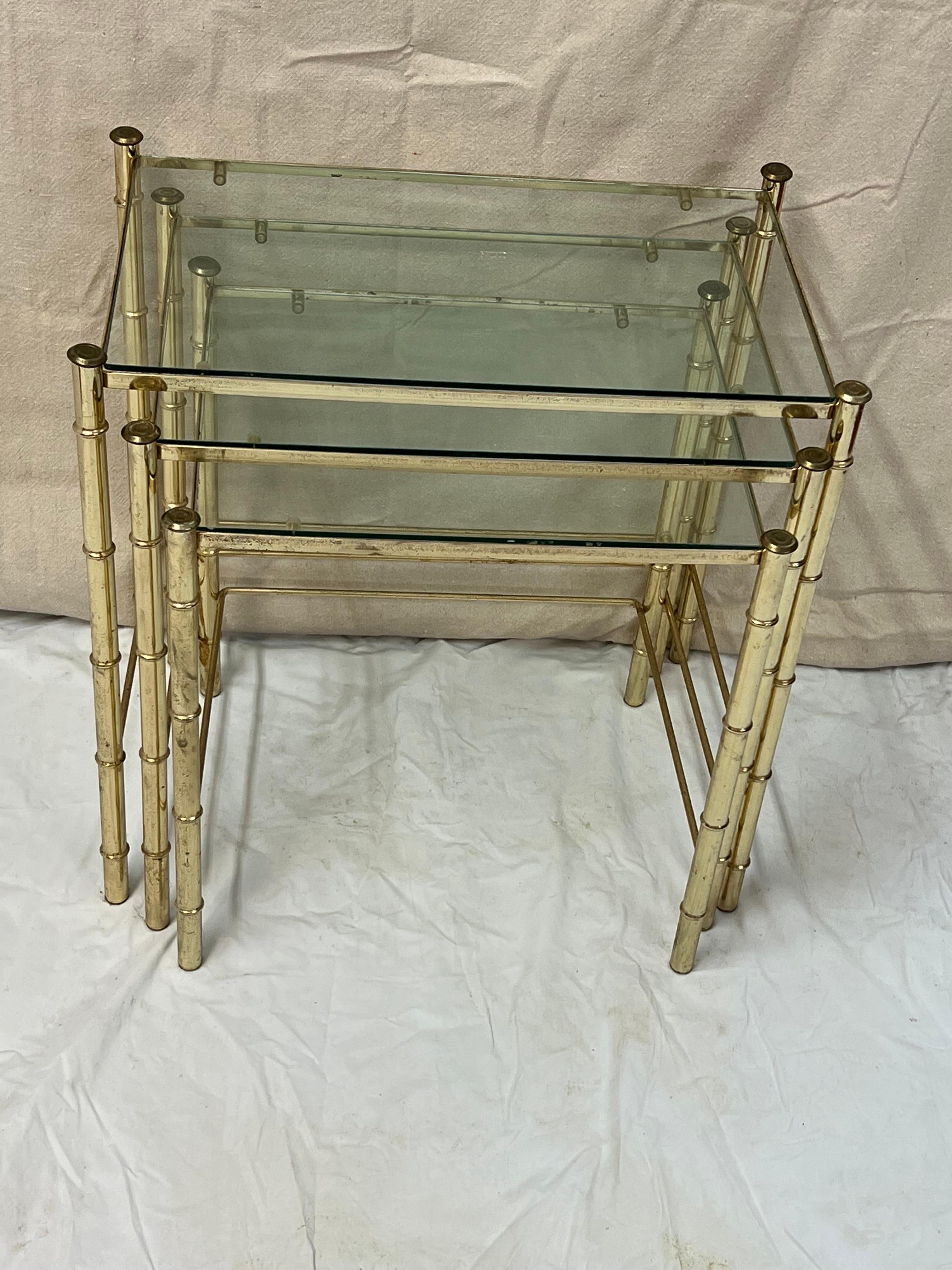 Hollywood Regency Set of Faux Bamboo Brass bamboo nesting tables with glass  For Sale