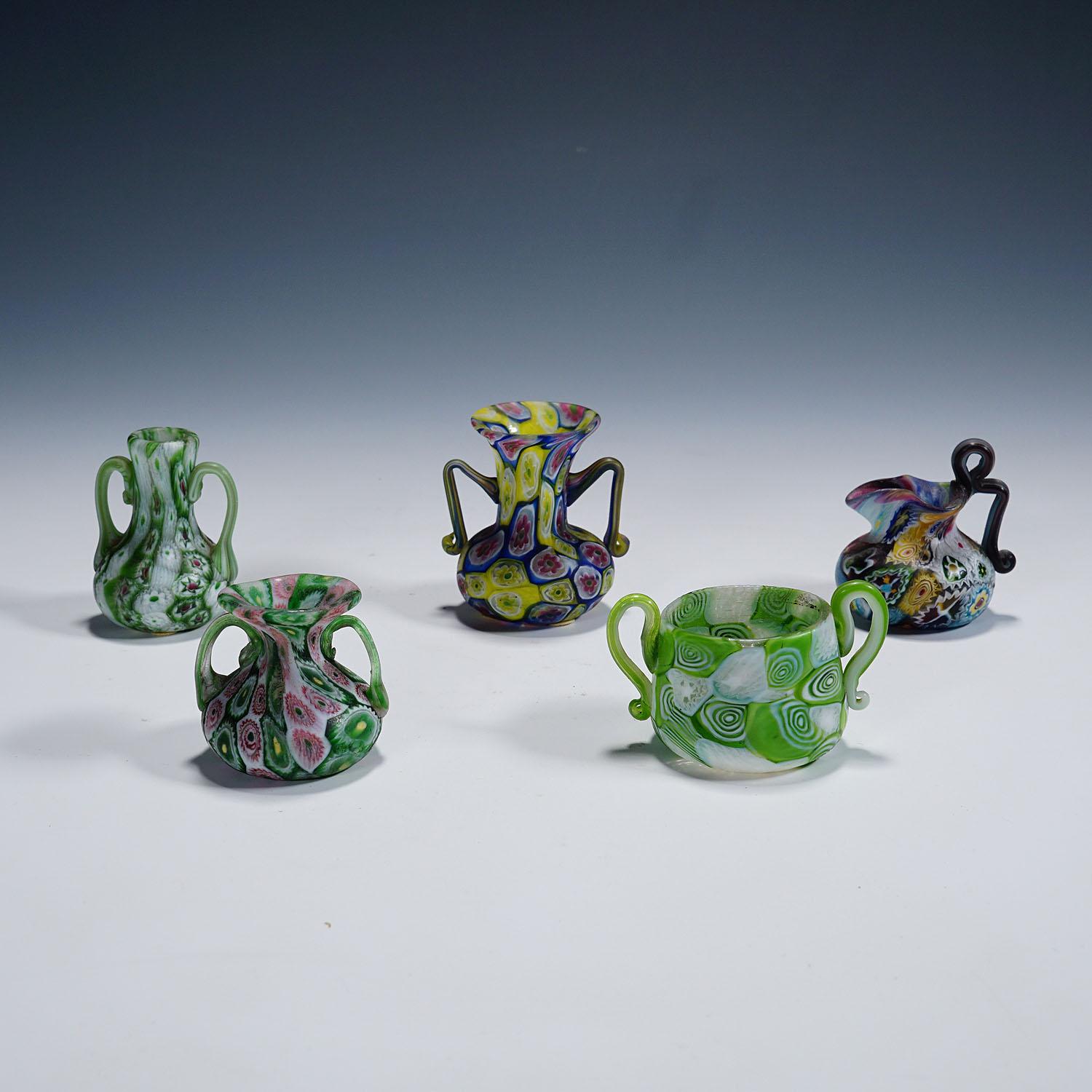 Set of Fife Antique Millefiori Vases by Fratelli Toso, Murano

A set of five millefiore murrine glass vases, manufactured by Vetreria Fratelli Toso around 1910-20.  All vases feature handles and are executed with polychrome multicoloured murrines.
