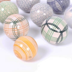 Set of Fifteen English Porcelain Carpet Balls