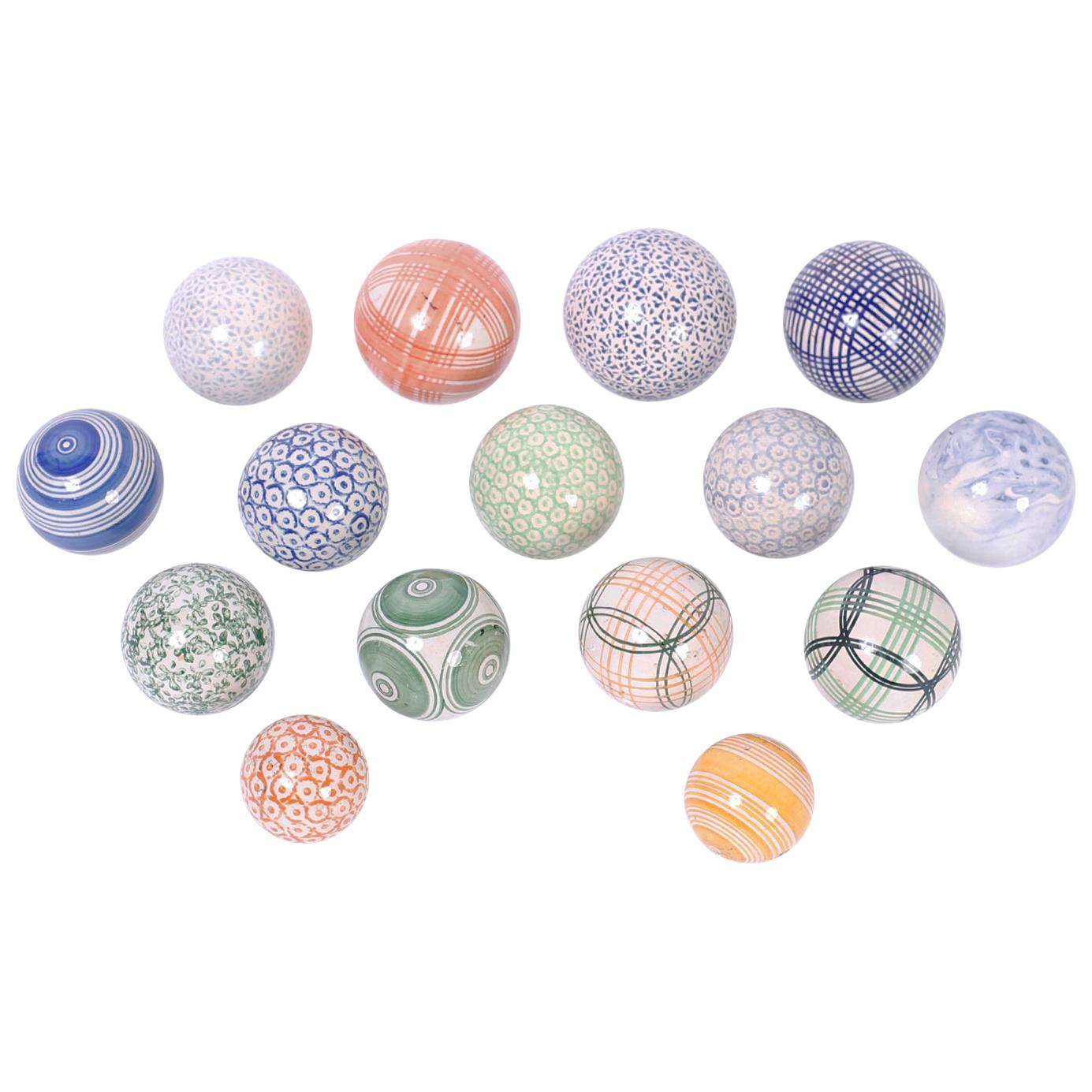 Set of Fifteen English Porcelain Carpet Balls