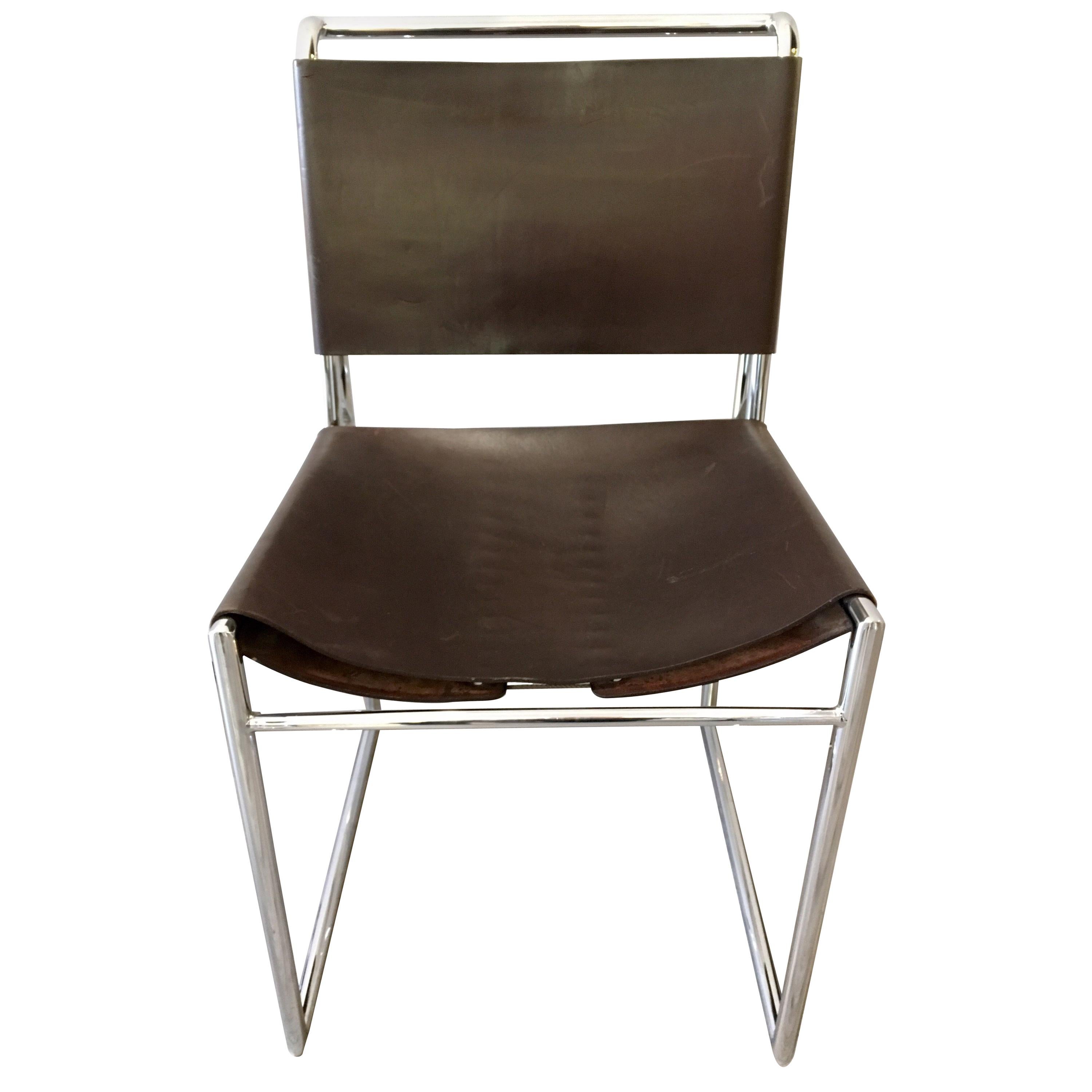 Set of fifty matching Marcel Breuer B40 dining chairs. These chairs feature heavy chrome, dark brown leather and the coveted leather corset system at backrest and seat bottom. We have several of these chairs which come out of one of the country's