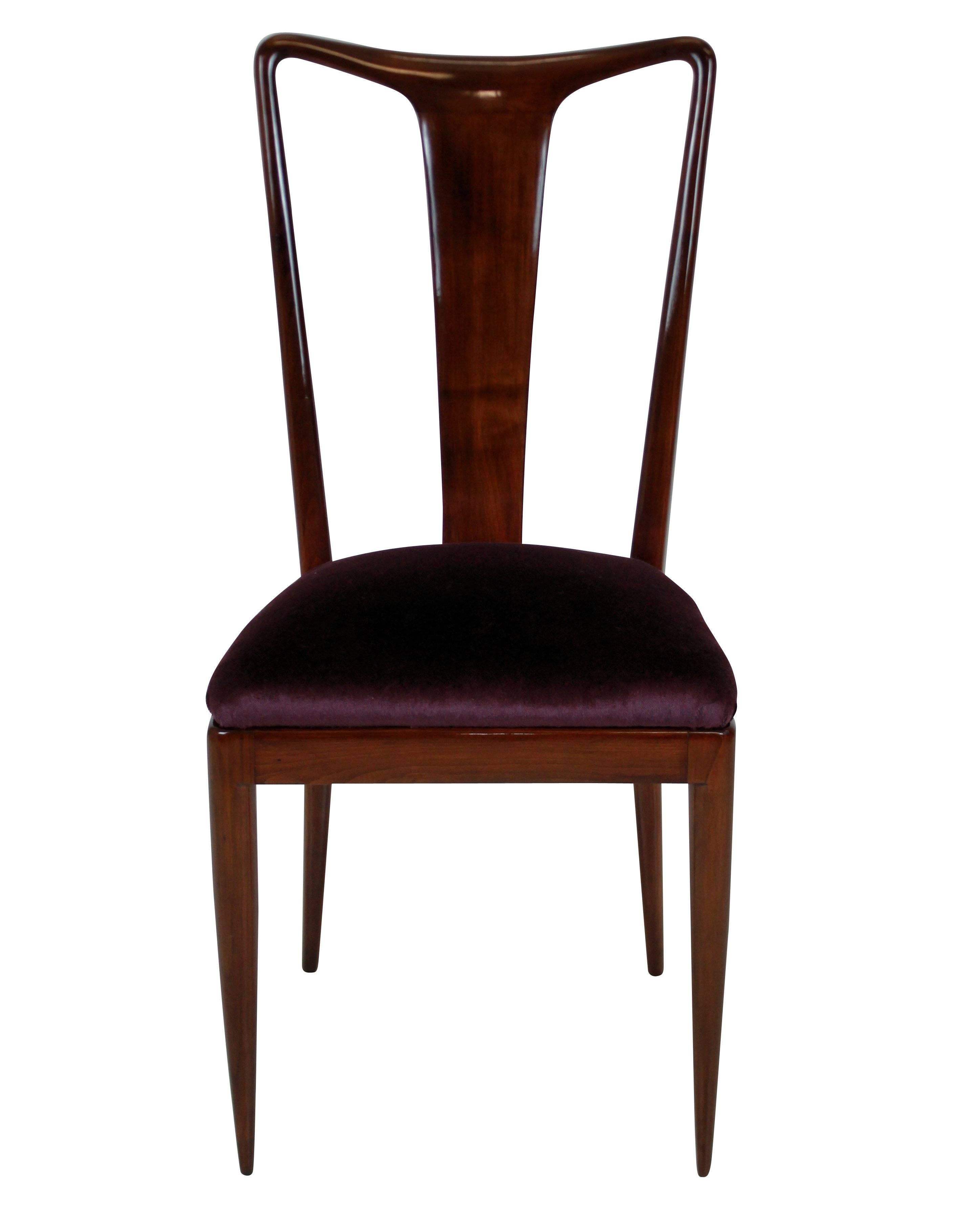 A set of six dining chairs of superb quality in the style of Ulrich. In beautifully sculpted and polished mahogany with Aubergine mohair velvet seats.


Measure: 49 cm high (seats).
   
