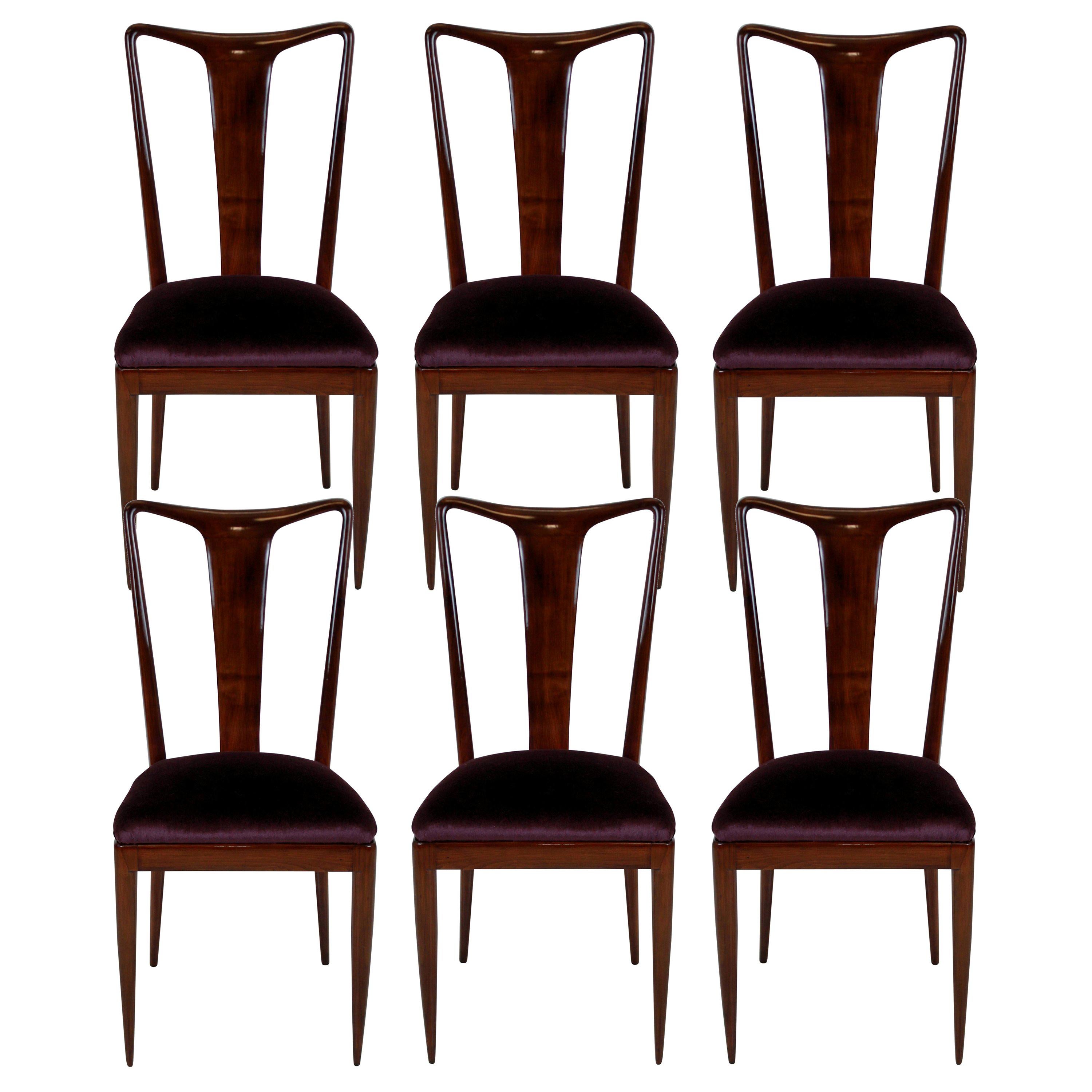 A set of six dining chairs of superb quality in the style of Ulrich. In beautifully sculpted and polished mahogany with aubergine mohair velvet seats.


Measure: 49 cm high (seats).
 