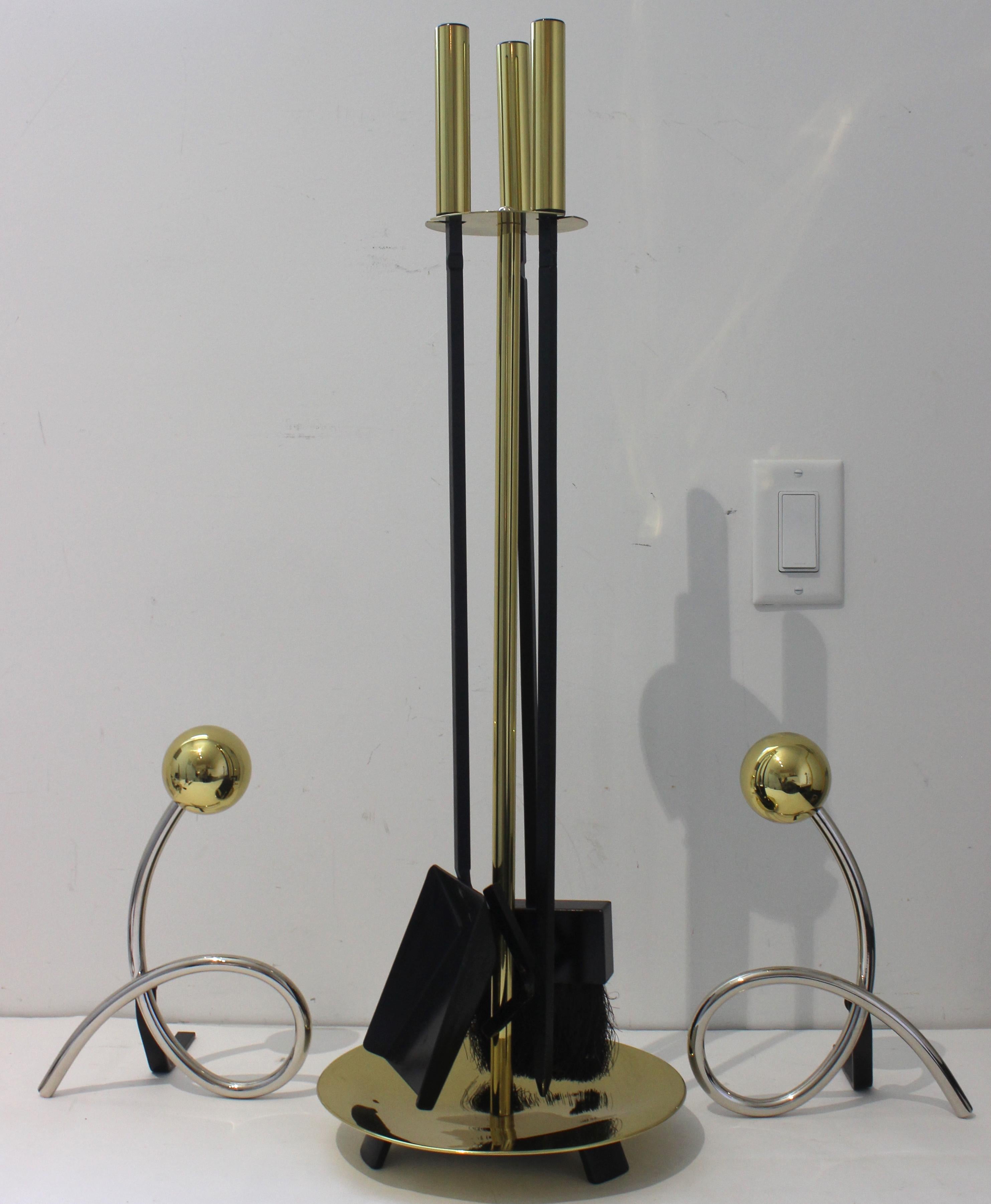 This stylish and chic set of fireplace tools and andirons are by Donald Deskey and they date to the 1950s-1960s.

Note: Dimensions of the andiron are 11