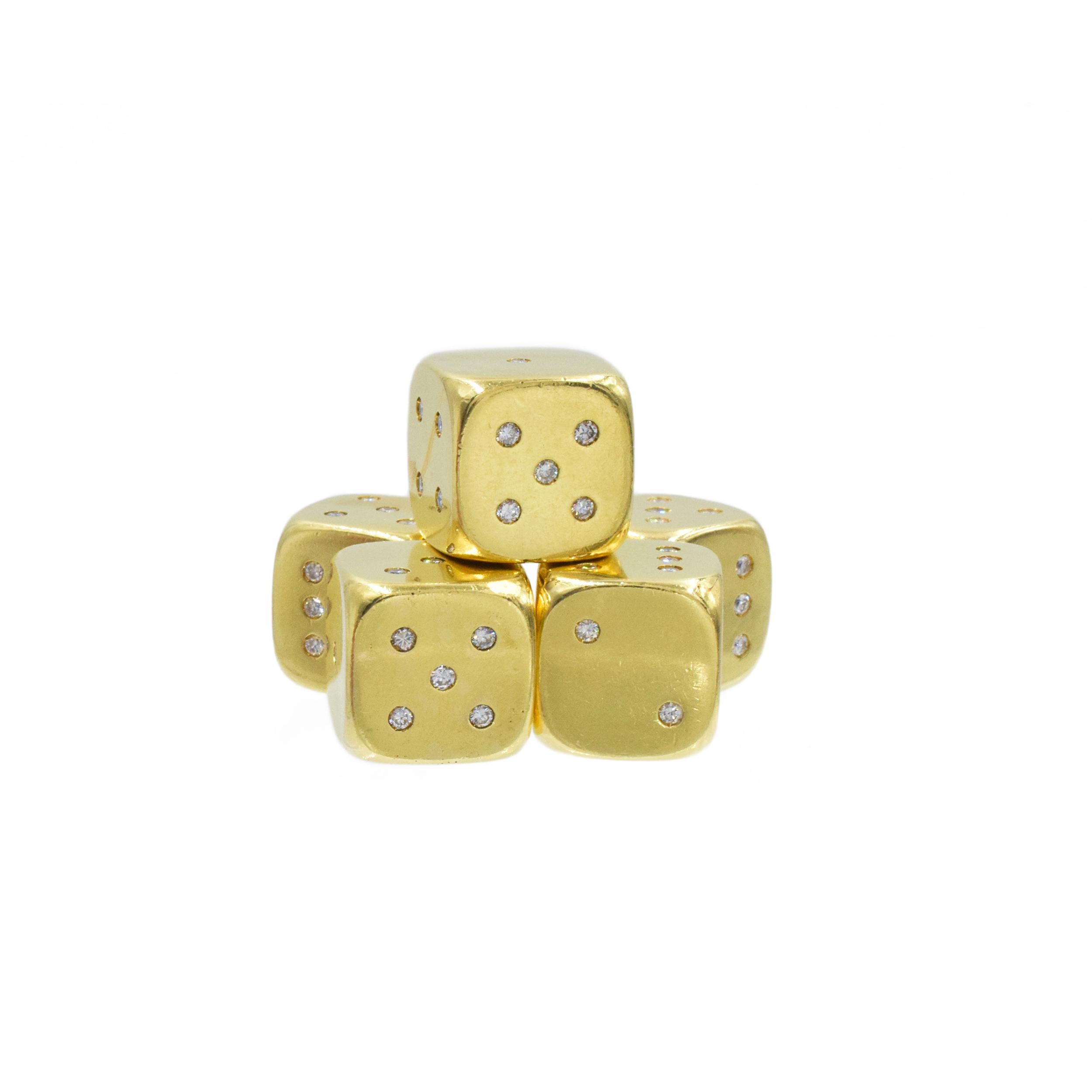 gold dice with diamonds