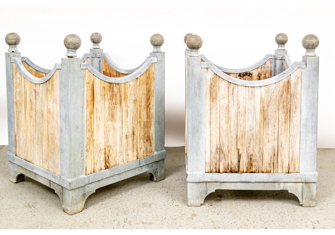 Architectural zinc finish metal frames with solid metal ball finials and having curved tops and wood slatted sides. The open bases with criss-cross metal supports. Very fine quality with good weight and aged patina.
Measures: Height 32 1/2