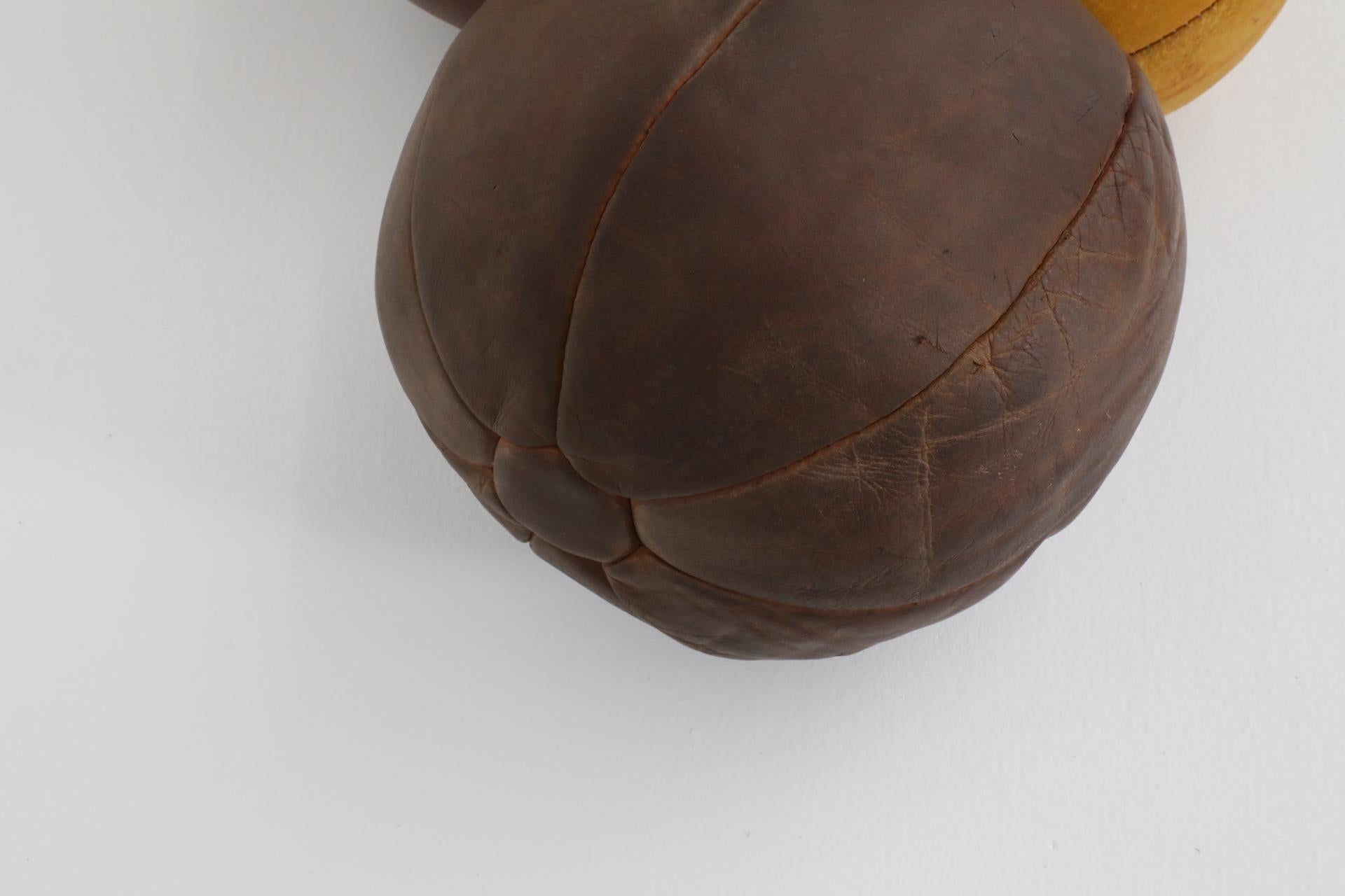 Set of Five Assorted Vintage Leather Gymnastics Medicine Balls In Good Condition For Sale In Los Angeles, CA