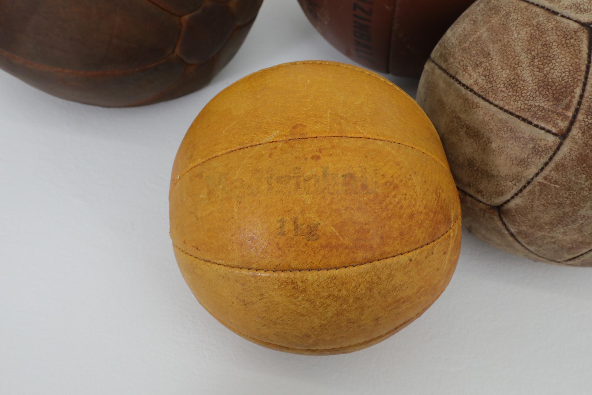 20th Century Set of Five Assorted Vintage Leather Gymnastics Medicine Balls For Sale