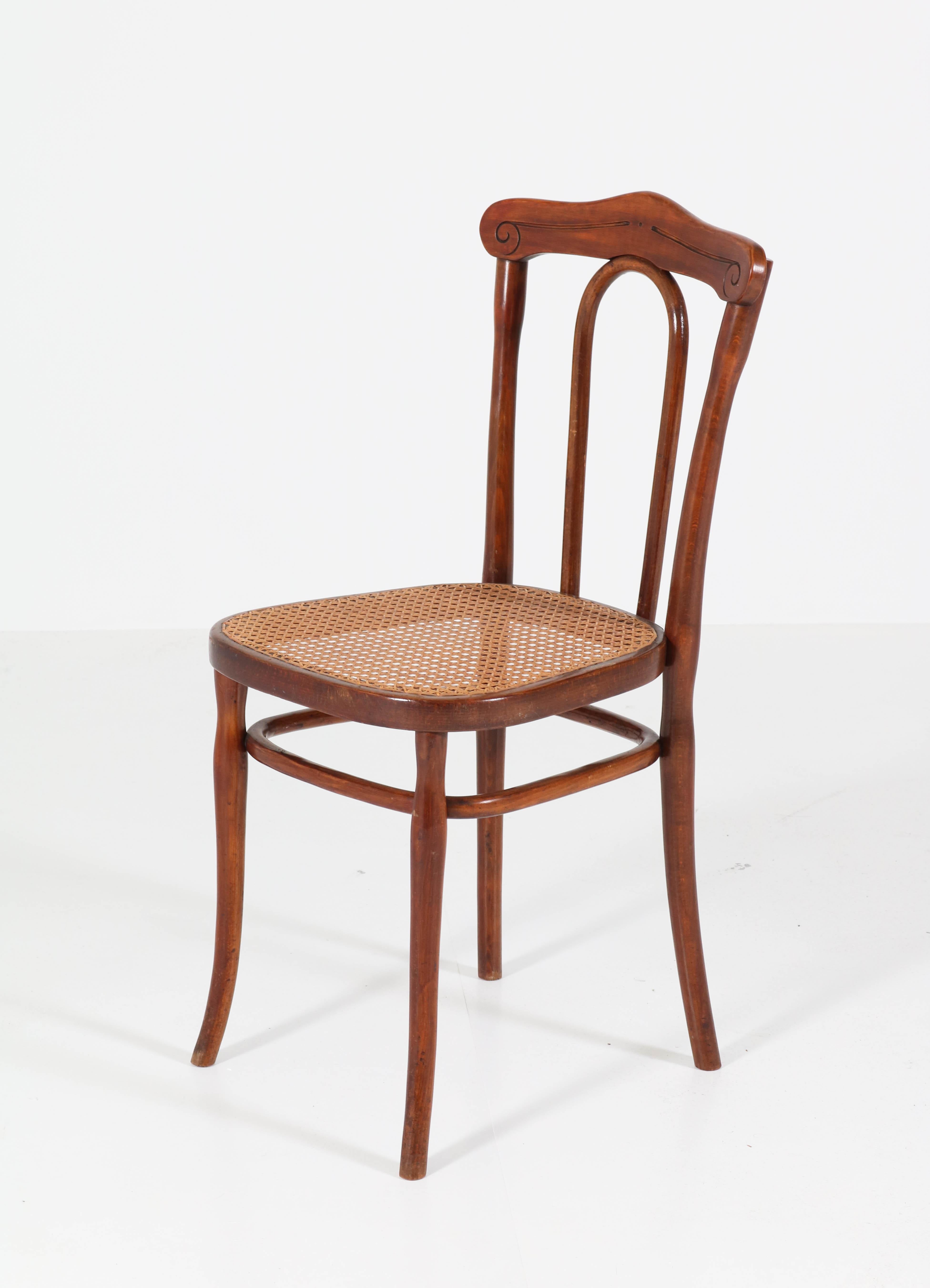 Wonderful and rare set of five Art Nouveau bentwood chairs.
Design by Jacob & Josef Kohn Wien.
Striking Austrian design from the 1890s.
All five are marked with the original manufacturers paper label.
The chairs are sturdy and the cane seating