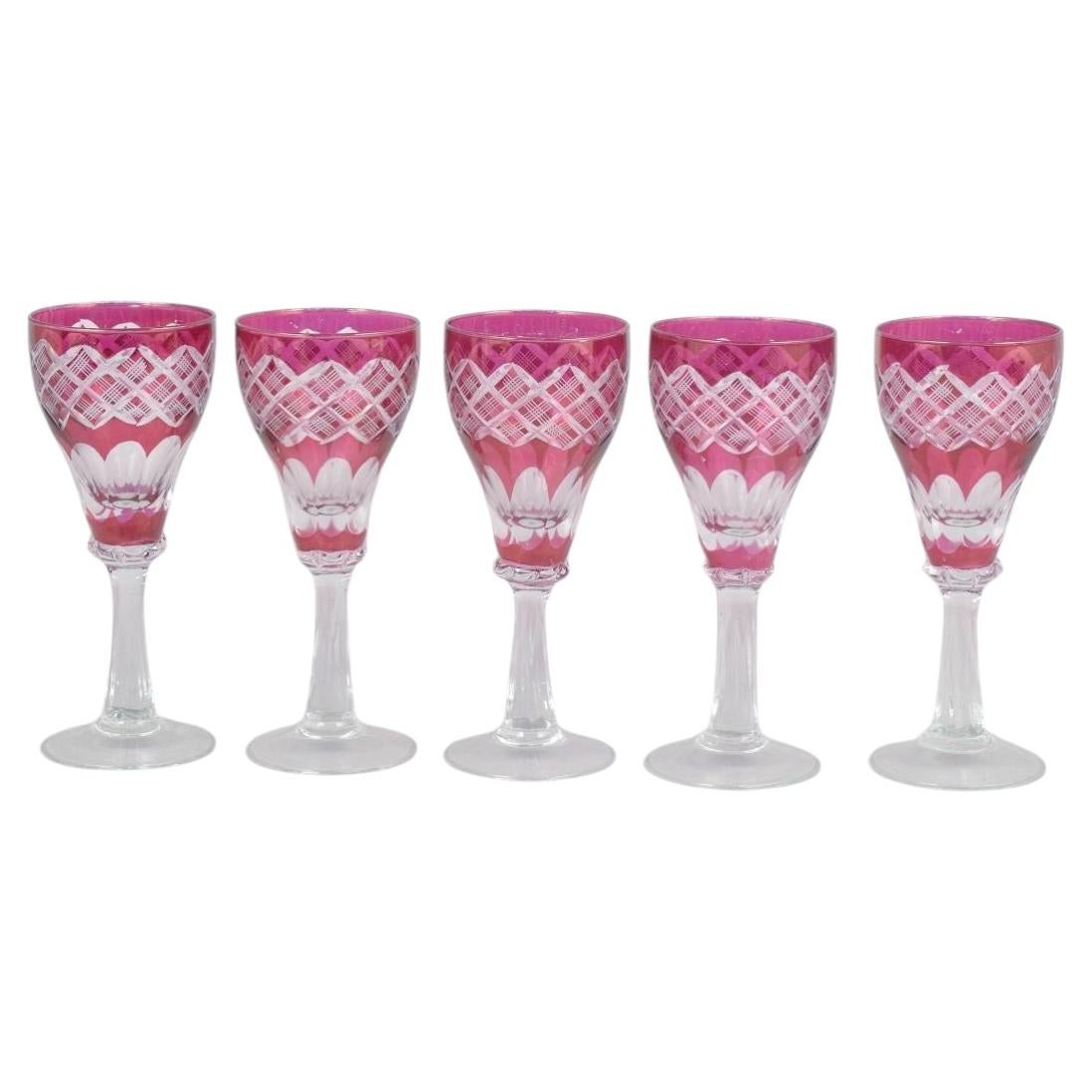 Set of five Bohemian pink crystal wine glasses with cut decoration. 1940s For Sale