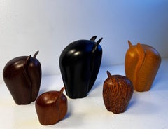 Set of five carved modernist Elephants in a mix of woods