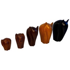 Set of five carved modernist Elephants in a mix of woods