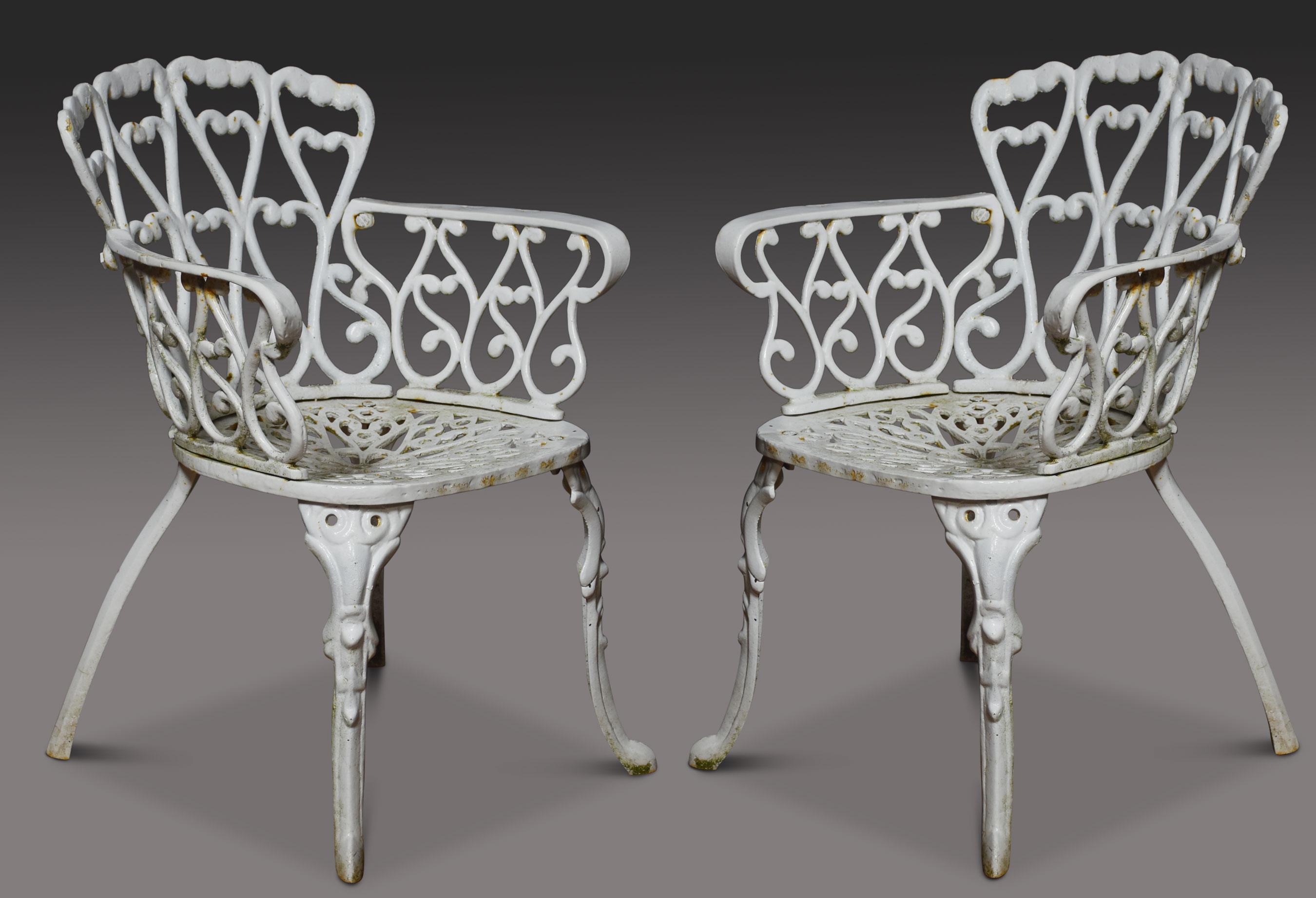 Set of five cast iron Coalbrookdale-style garden chairs, having shaped backs and scrolling arms to the ornate seats raised on slender supports.
Dimensions
Height 28.5 Inches height to seat 15
Width 20 Inches
Depth 22 Inches