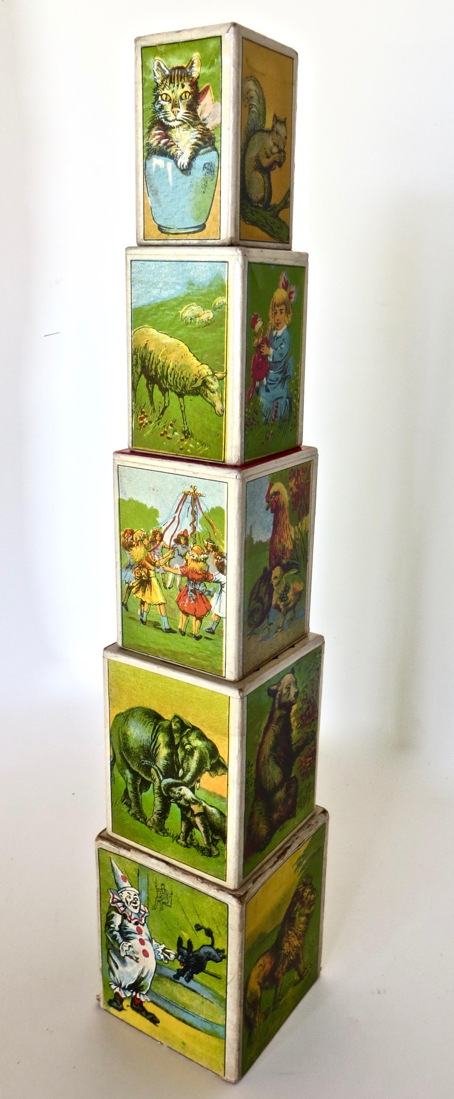 Lovely set of colorful early 1900's lithographed five block set of alphabet nesting blocks; used as both an educational item as well as toy/game amusement for children in teaching them 