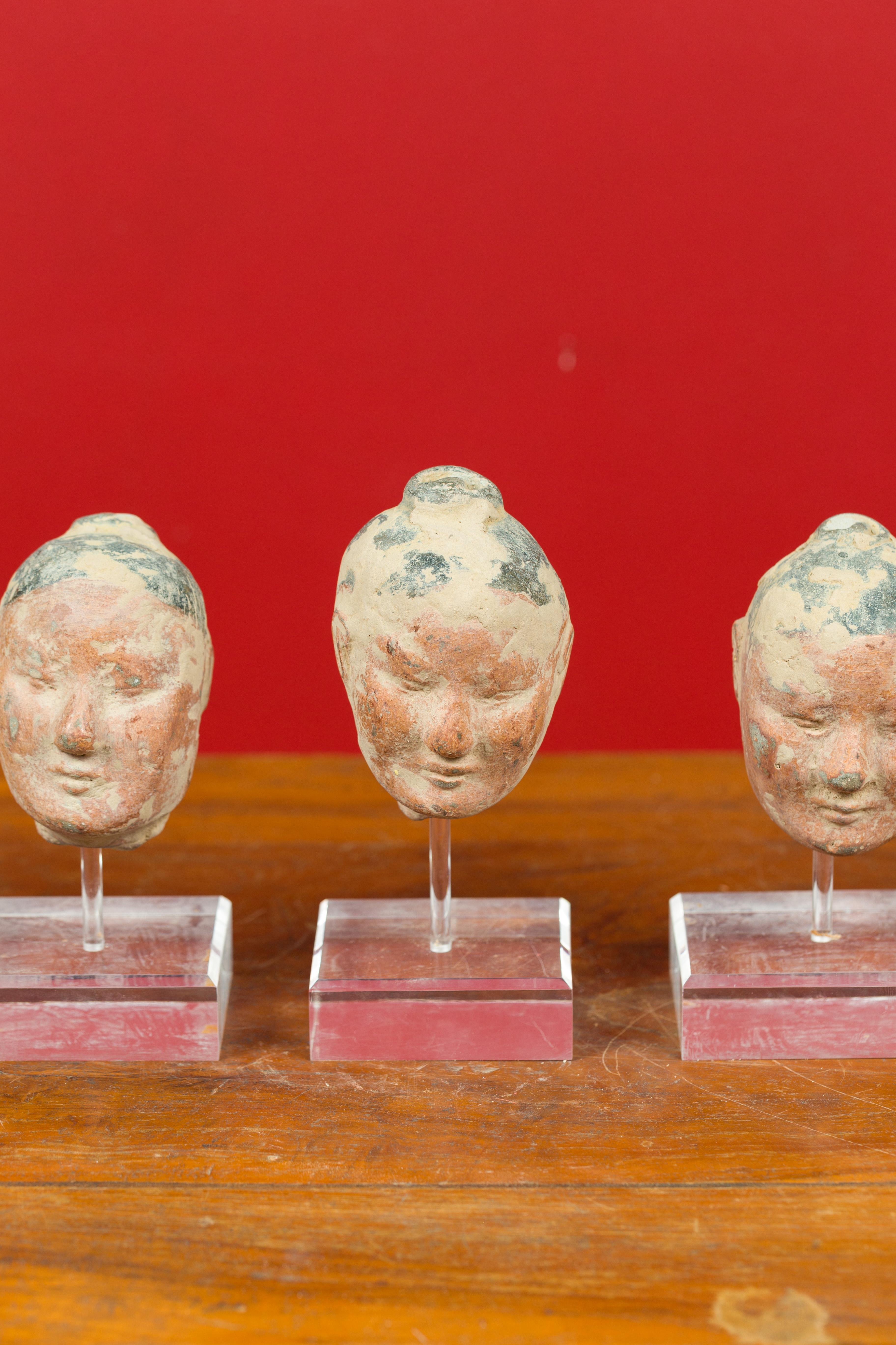 18th Century and Earlier Set of Five Chinese Han Dynasty Terracotta Heads with Original Paint on Lucite