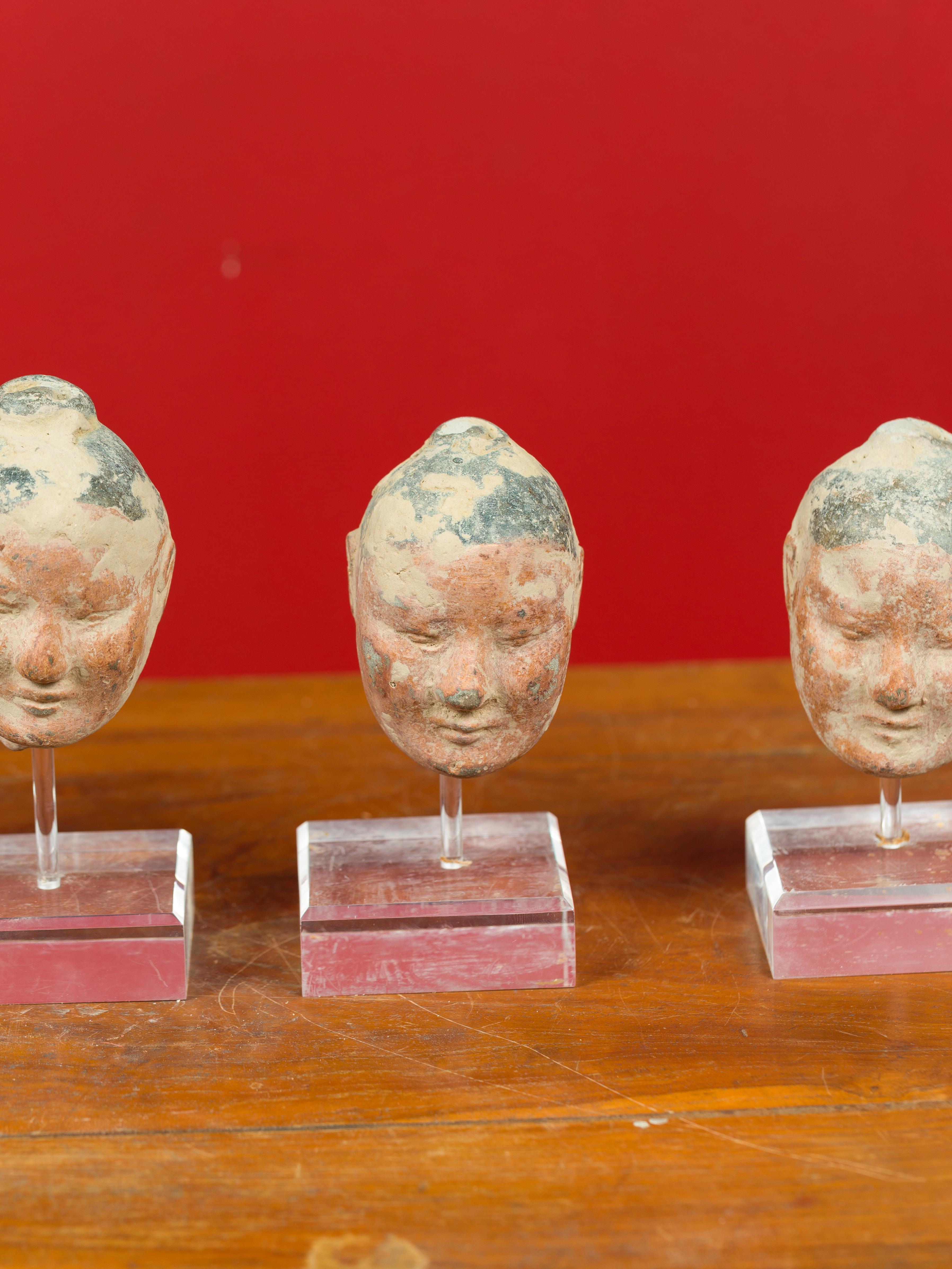Set of Five Chinese Han Dynasty Terracotta Heads with Original Paint on Lucite 1