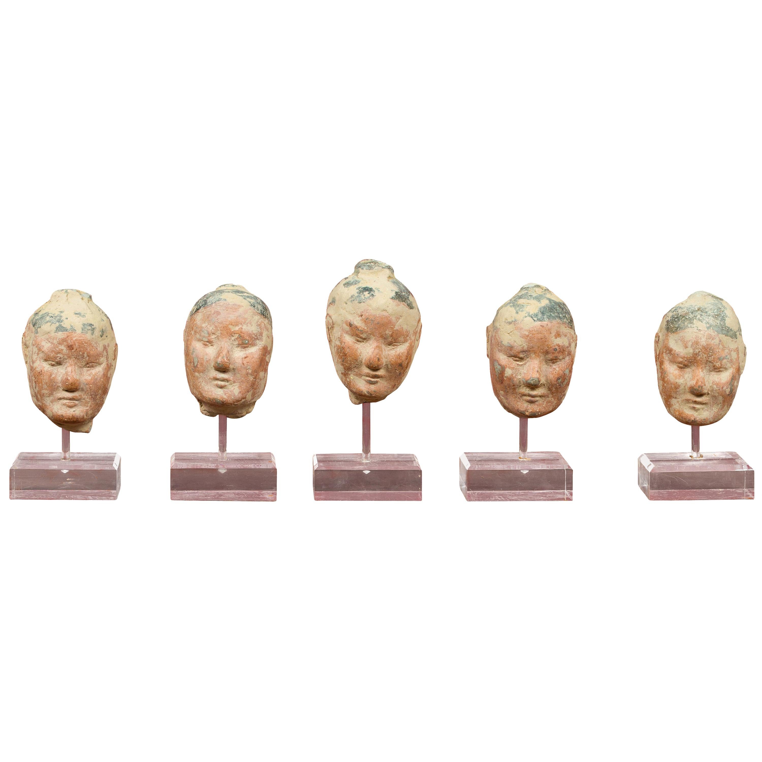 Set of Five Chinese Han Dynasty Terracotta Heads with Original Paint on Lucite