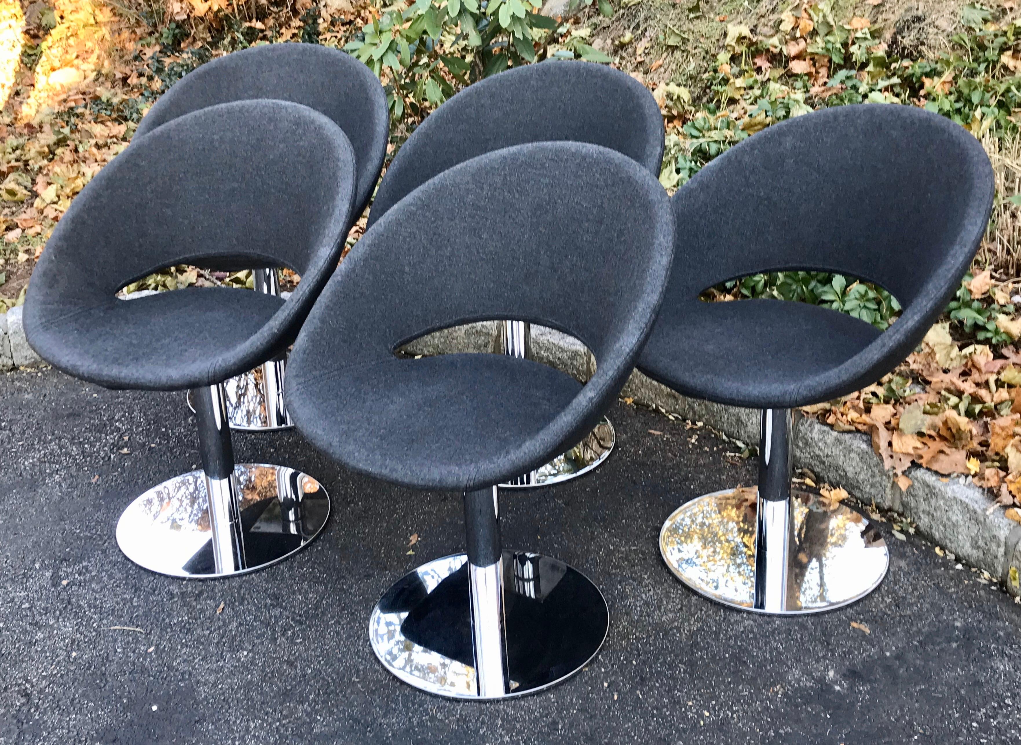 Beautiful set of 5 swivel base dining chairs, chrome base with large circular bottom, charcoal gray fabric, similar to the designs of B&B Italia. Very high end and very heave base.