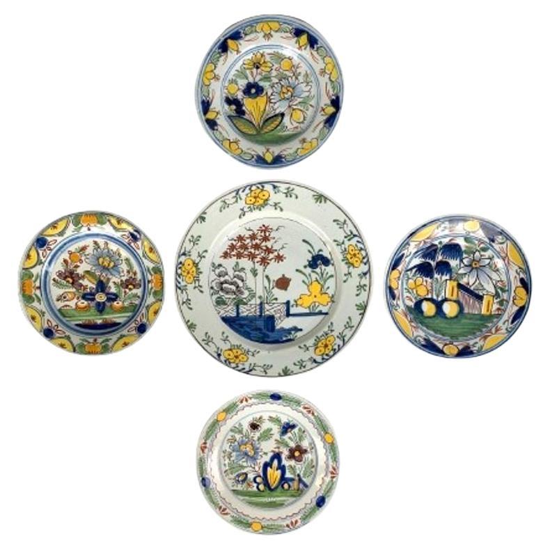 Set of Five Dutch Delft Plates Hand Painted Circa 1800 Diameters 9" and 12.25" For Sale