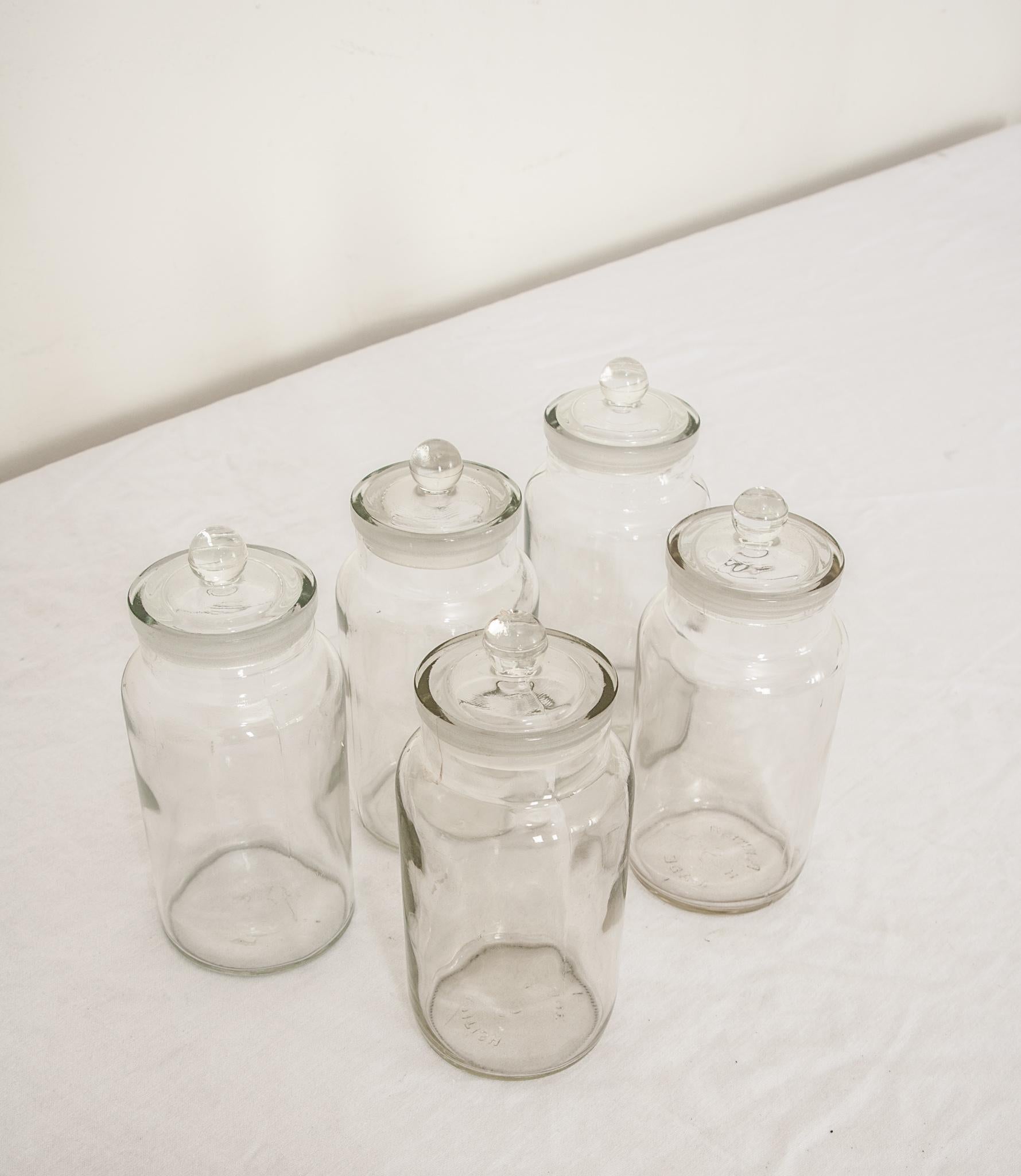 Hand-Crafted Set of Five English Lidded Glass Apothecary Jars For Sale
