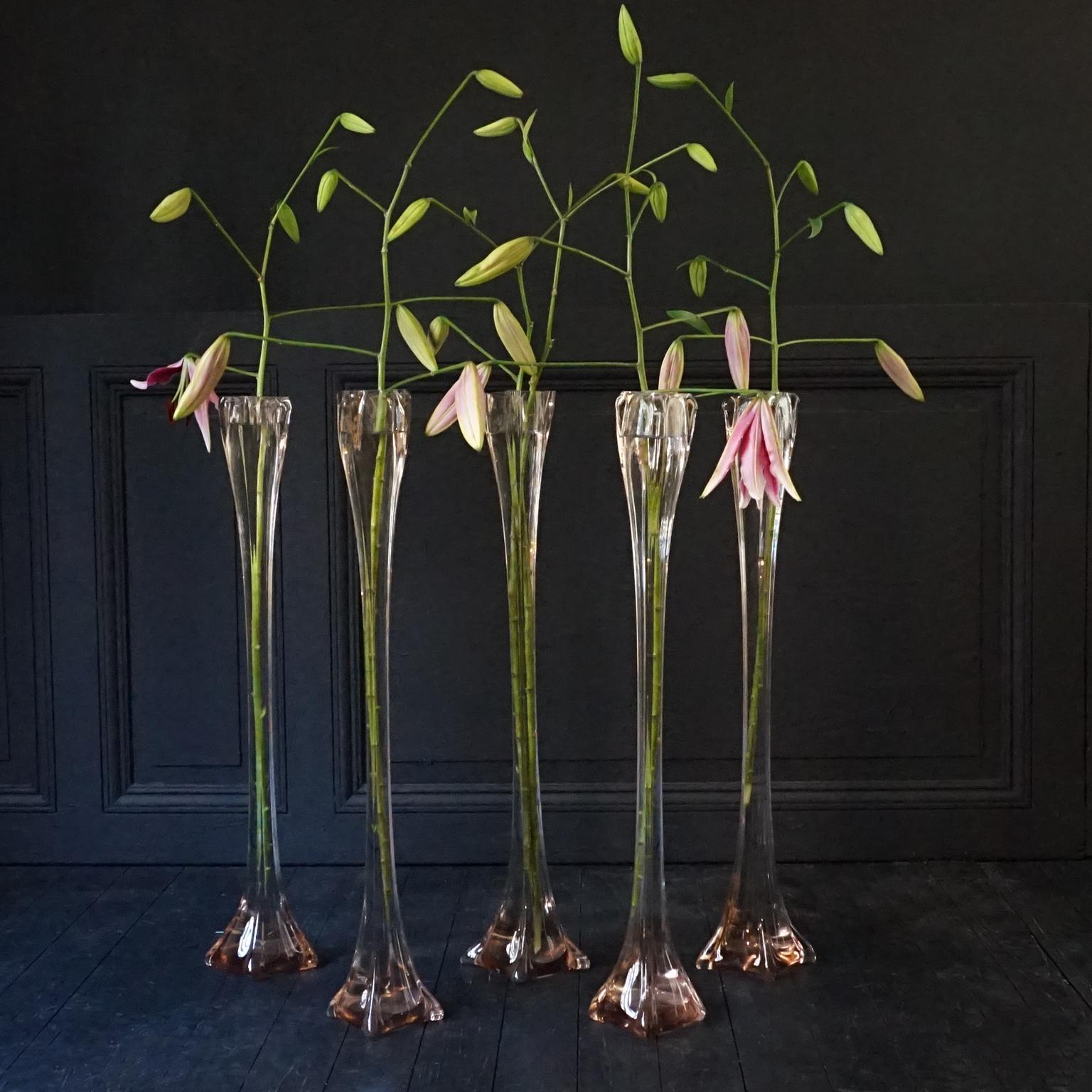 Very pretty set of five tall heavy antique pink blown glass solifleur lily vases.
All of them are slightly different because they are handmade.
The bottom of the vases vary in size as they are free formed clumps of glass, because of the heaviness of