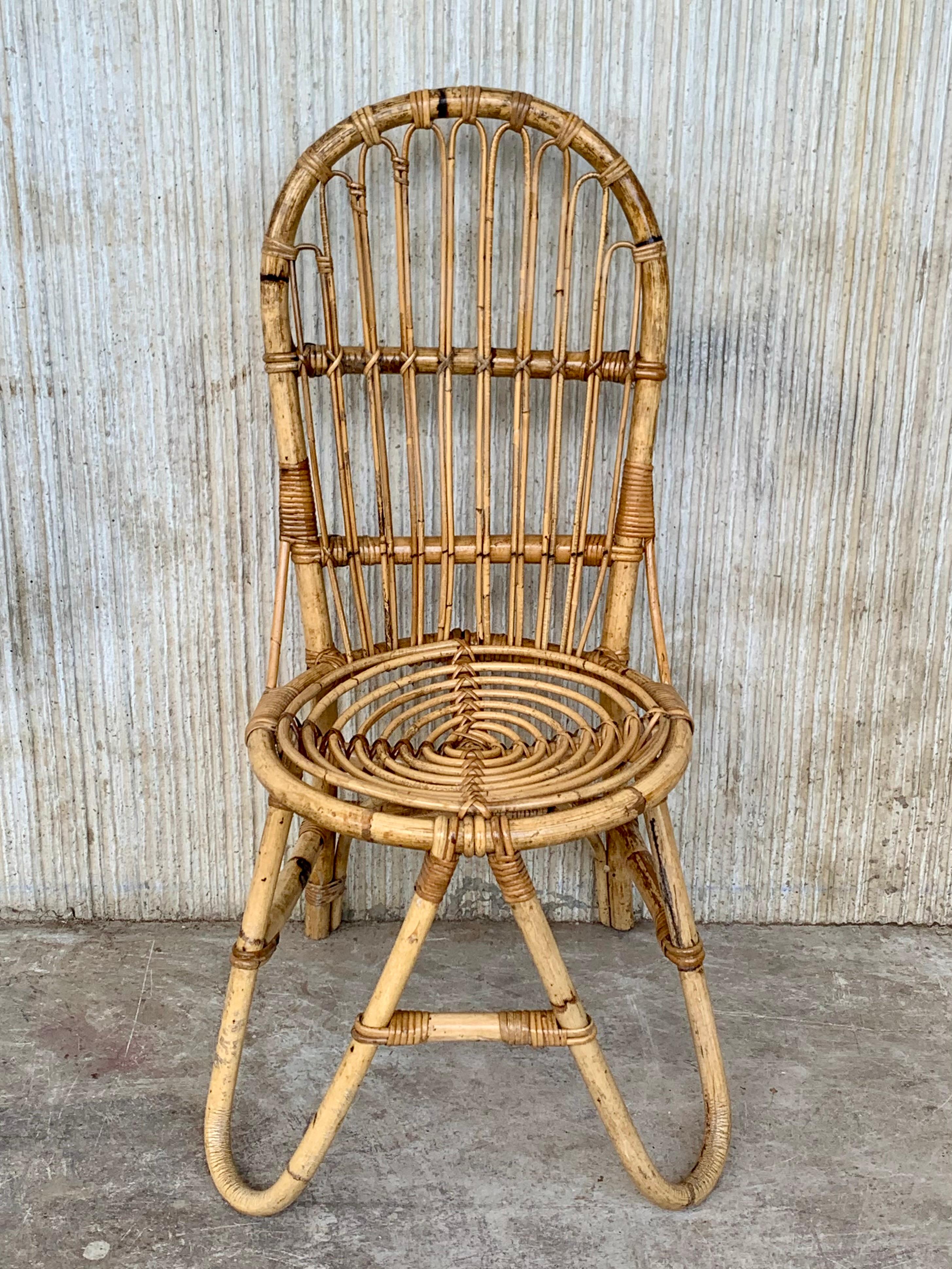 Five French bamboo and rattan dining or occasional chairs. Excellent original condition. No breaks to the bamboo or rattan.