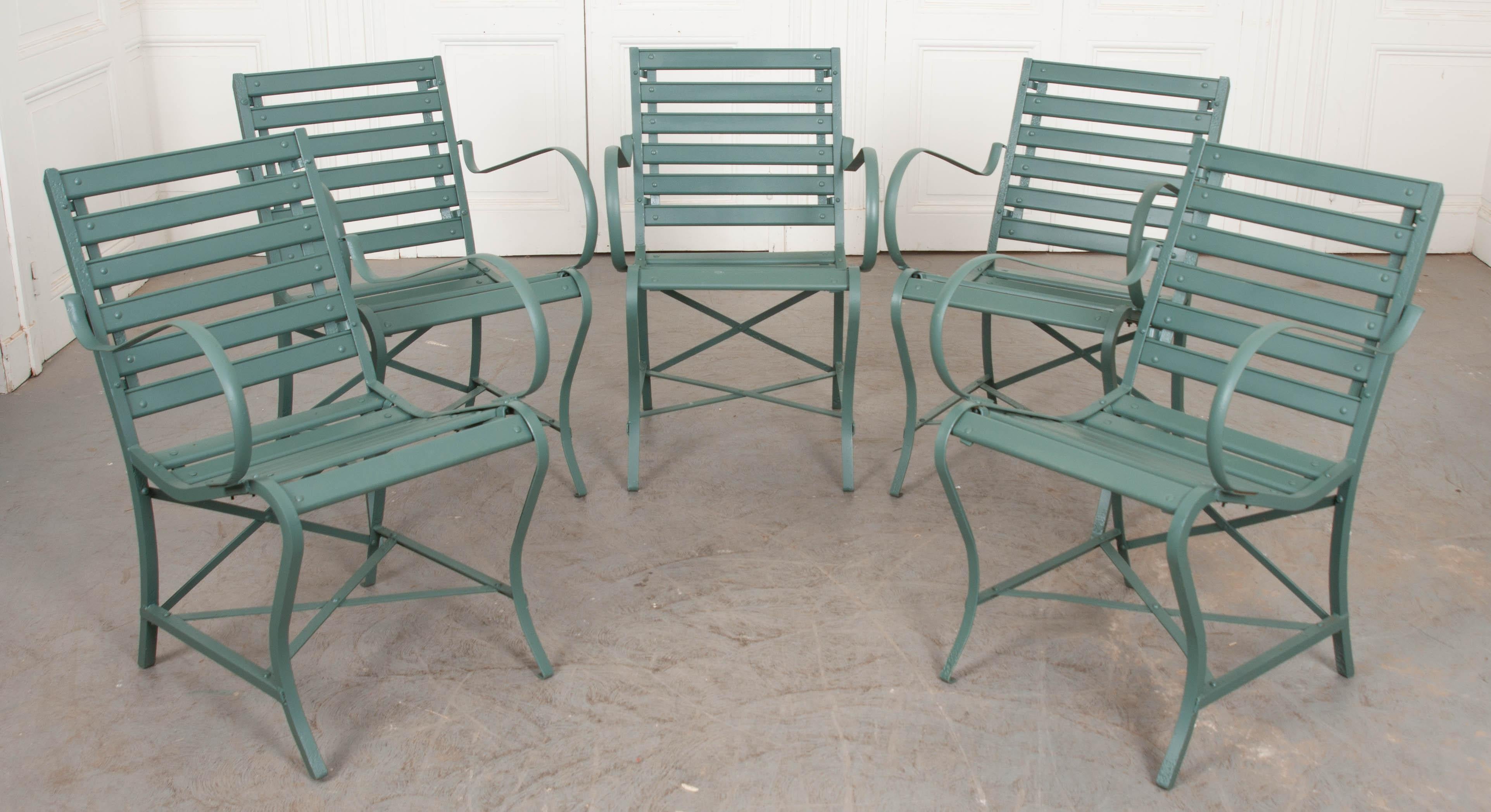This cheerful set of five garden chairs was made in France towards the beginning of the 20th century. While the frames are vintage, when we purchased them in France, the wooden slats needed replacing. Once stateside, we replaced all slats with new,