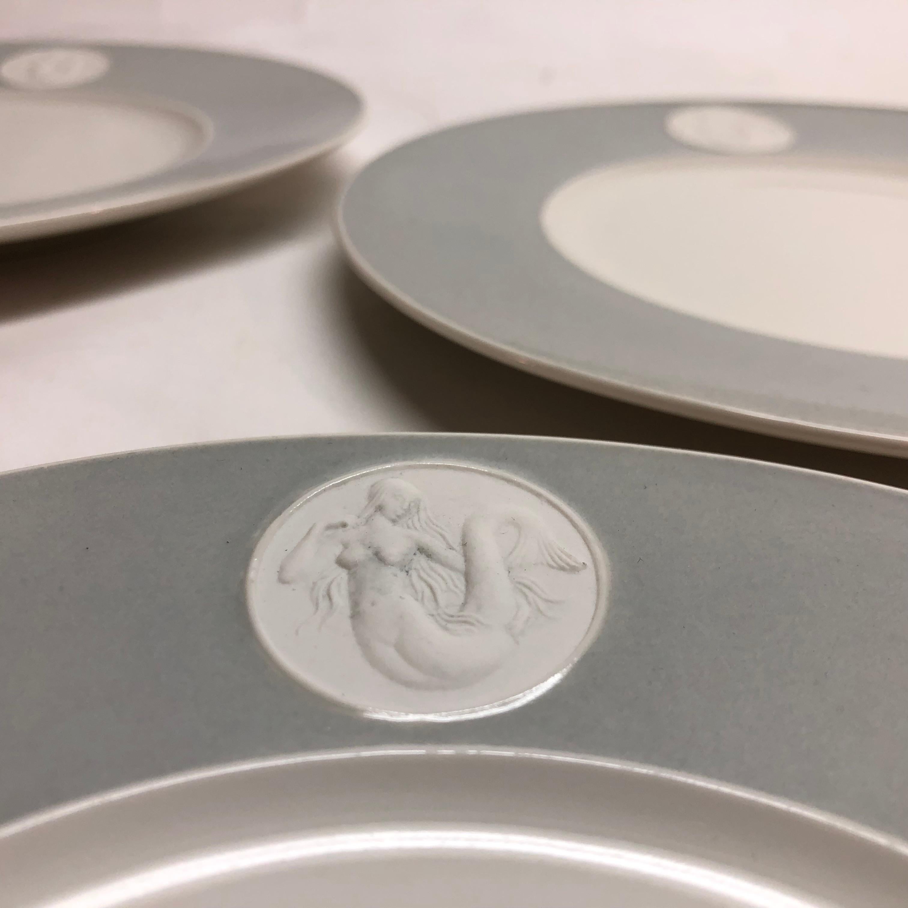 Set of five gray Royal KPM Arcadia pattern siren plates.