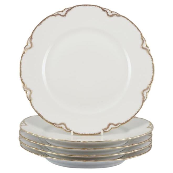 Set of five ‘Haviland’ porcelain dinner plates with gold decoration, 1930s/40s