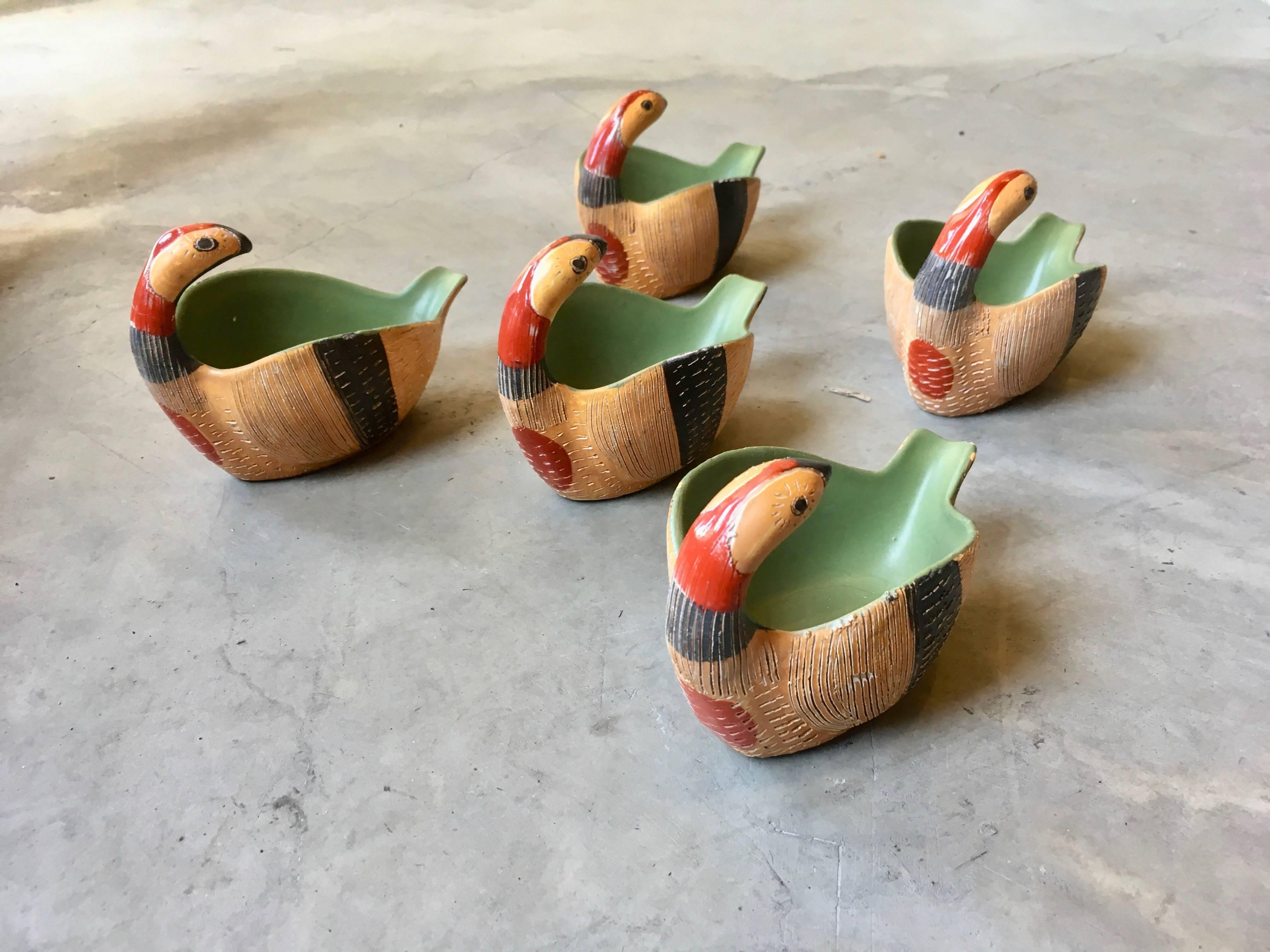 Interesting ceramic bowls in the shape of a bird. Great paint and coloring. Could be used as a bowl or small serving dish. Good vintage condition. Hand-sculpted and hand-painted. Marked Italy 95/607 on bottom of each bowl. Sold as a set of 5.
