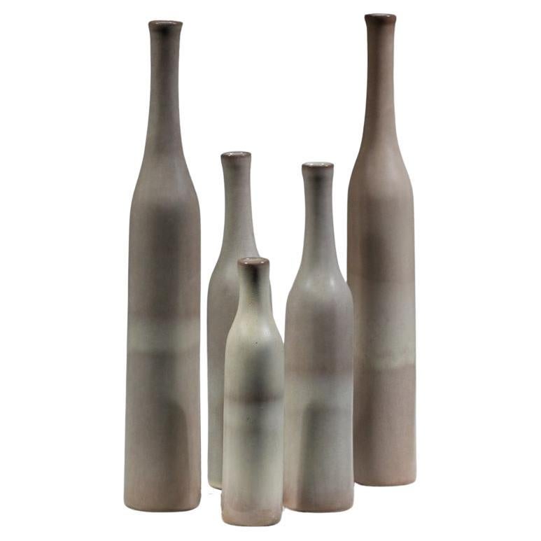 set of five Jacques et Danièle Ruelland gray-glazed ceramic vases 