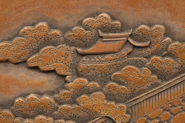 Set of five Japanese plates with carvings of the Itsukushima Shrine by