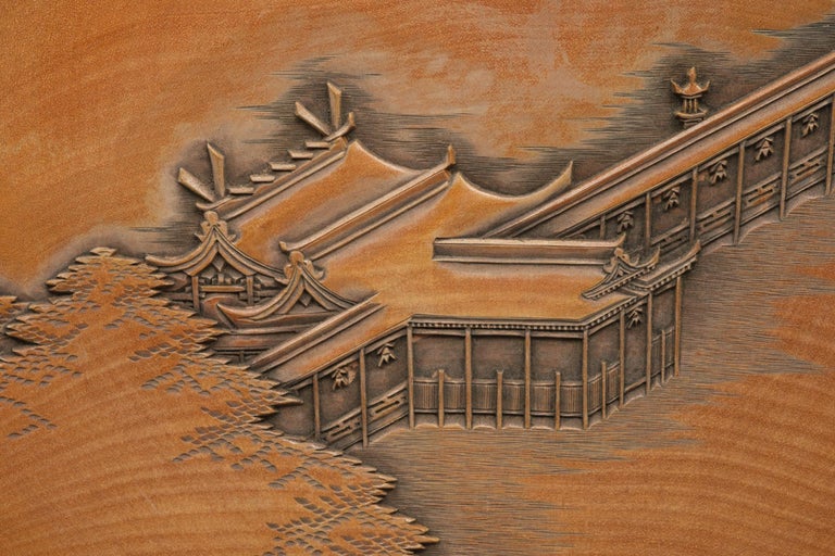 Set of five Japanese plates with carvings of the Itsukushima Shrine by