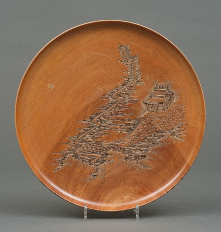 Set of five Japanese plates with carvings of the Itsukushima Shrine by
