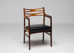 Set of Five Johannes Andersen Dining Room Chairs in Teak and Black Naugahyde